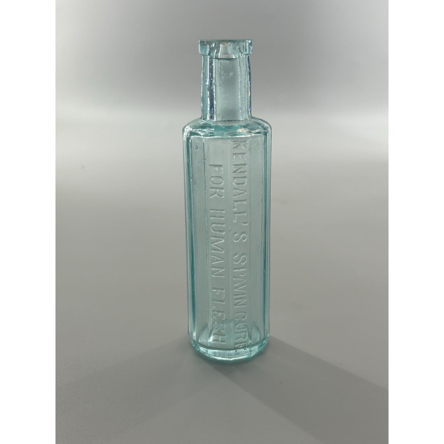 Antique Kendall’s Spavin Cure For Human Flesh Bottle – Aqua Glass Embossed Patent Medicine c1900
