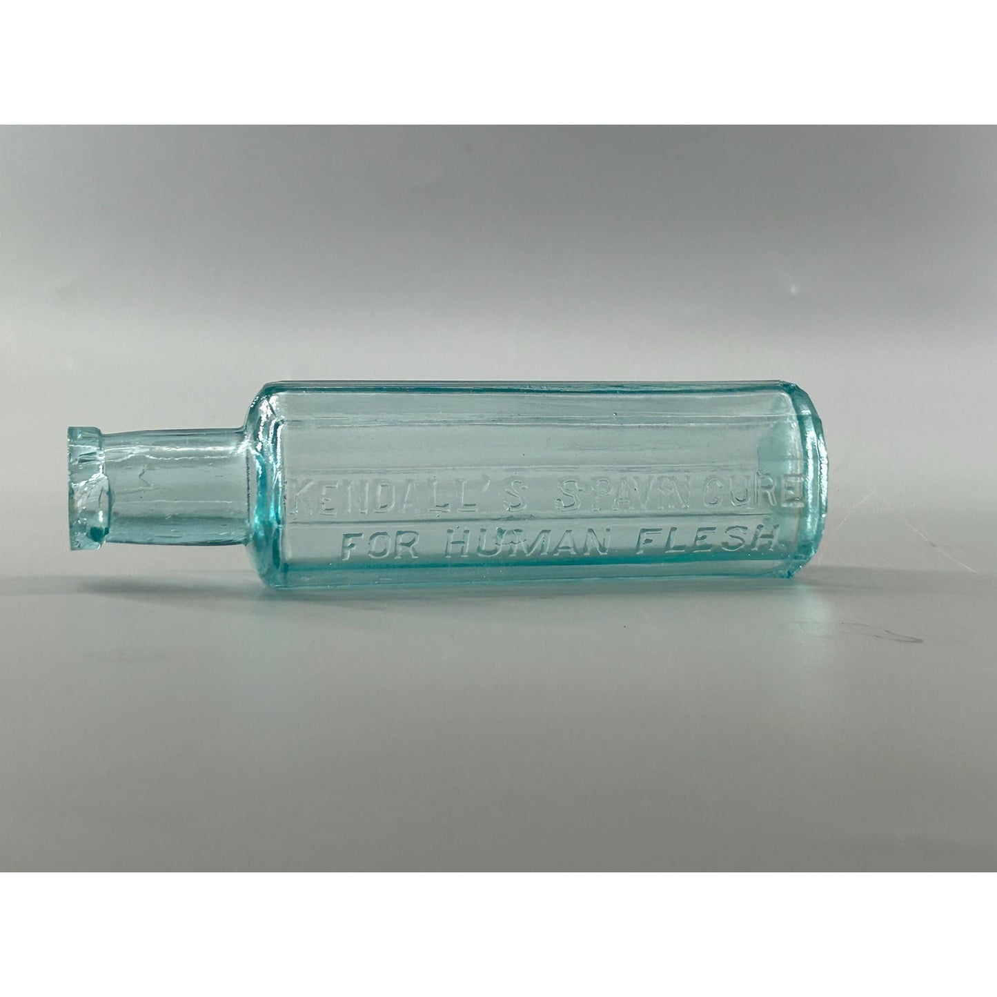 Antique Kendall’s Spavin Cure For Human Flesh Bottle – Aqua Glass Embossed Patent Medicine c1900