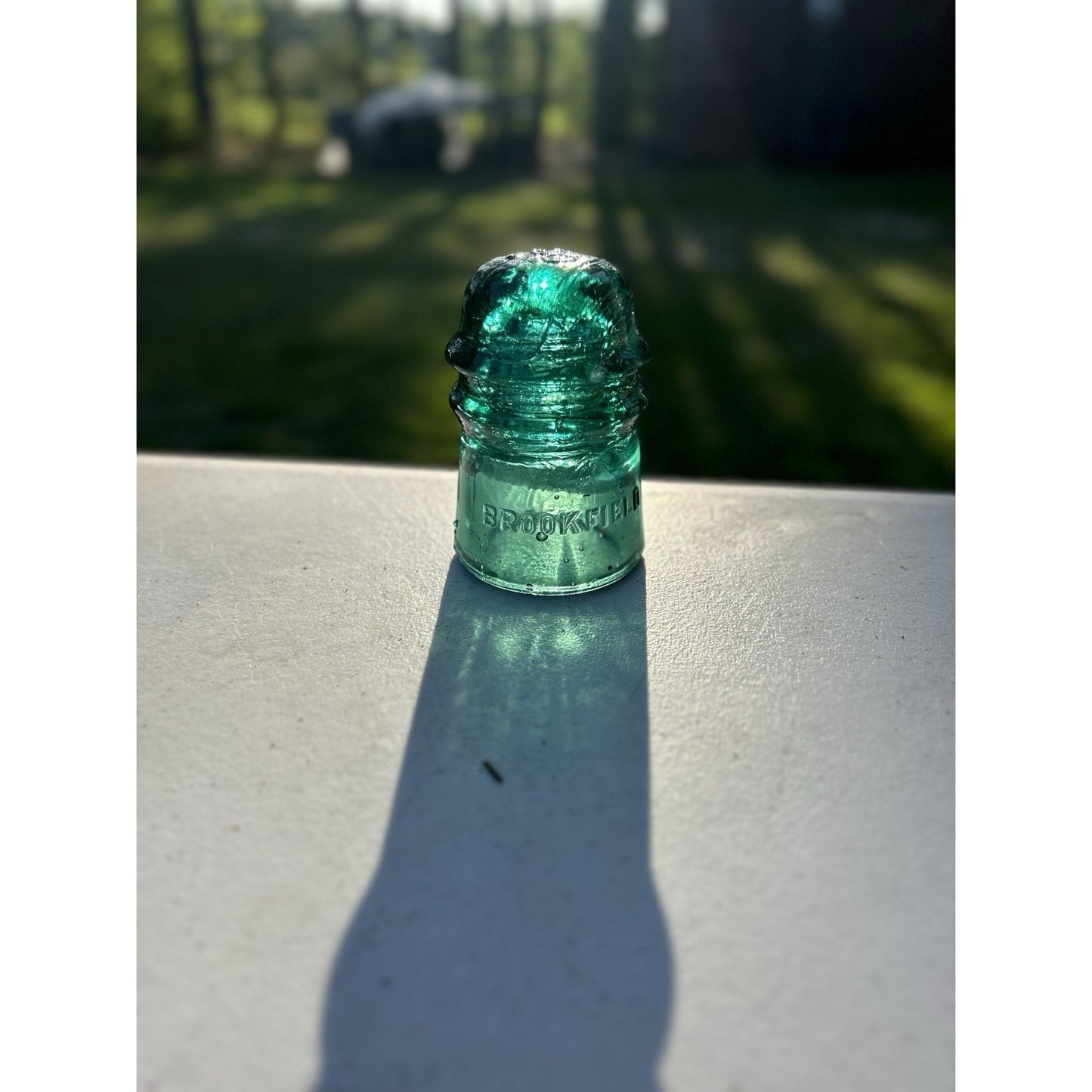 Vintage Brookfield Glass Insulator — Dark Emerald Green with Heavy Bubble Glass