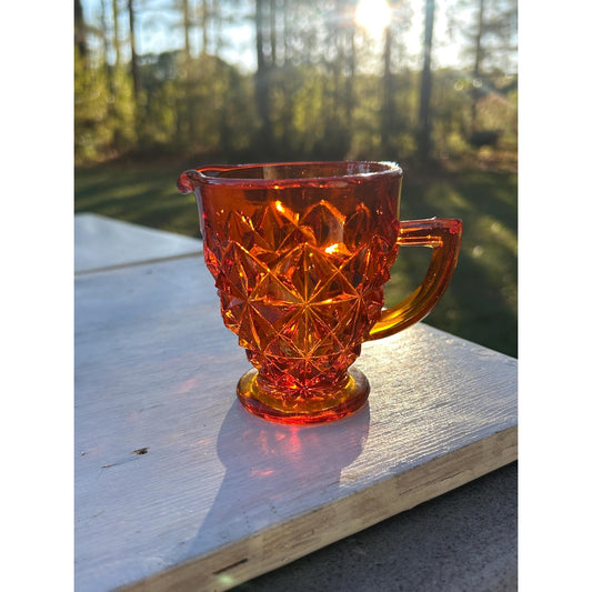 Selenium diamond point glass creamer UV reactive red orange vintage art glass amberina front