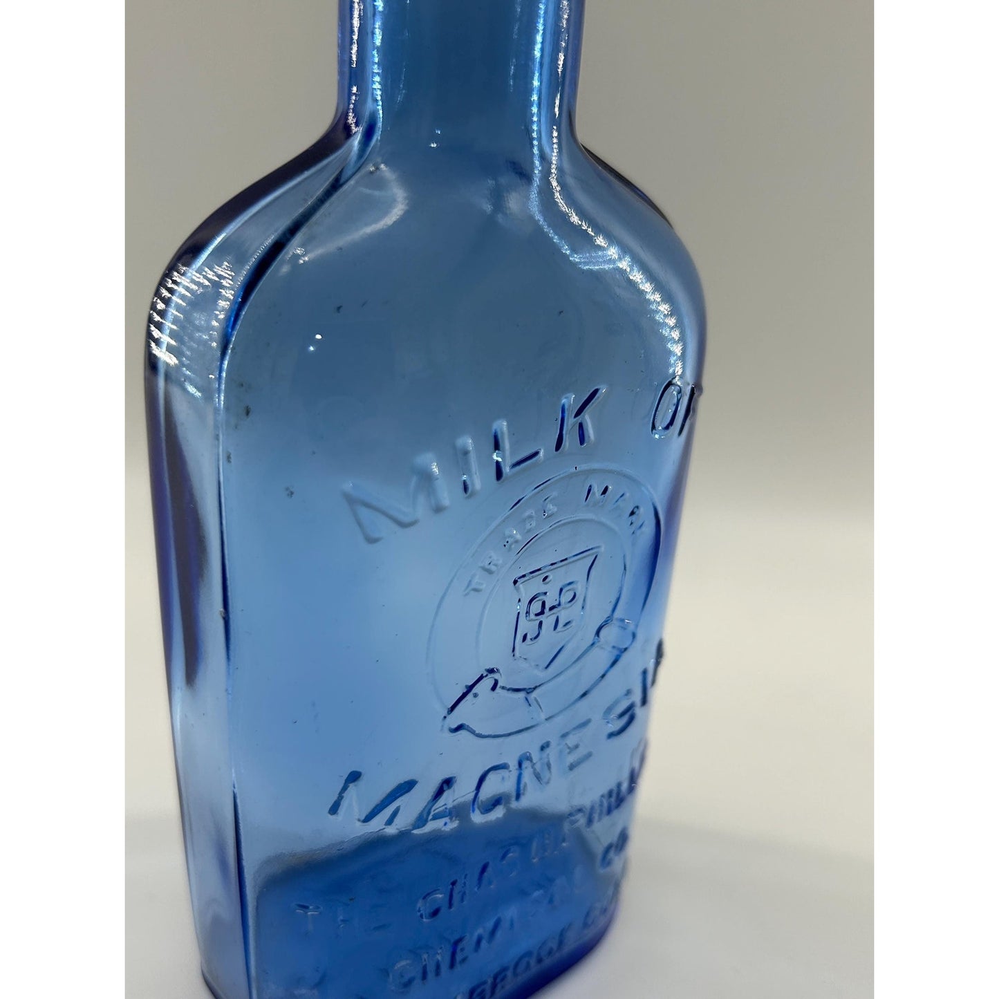 Antique Apothecary Milk of Magnesia Bottle c. 1910–1925 | Blue Glass Chas H Phillips Chemical Co. Cobalt blue apothecary bottle decor
