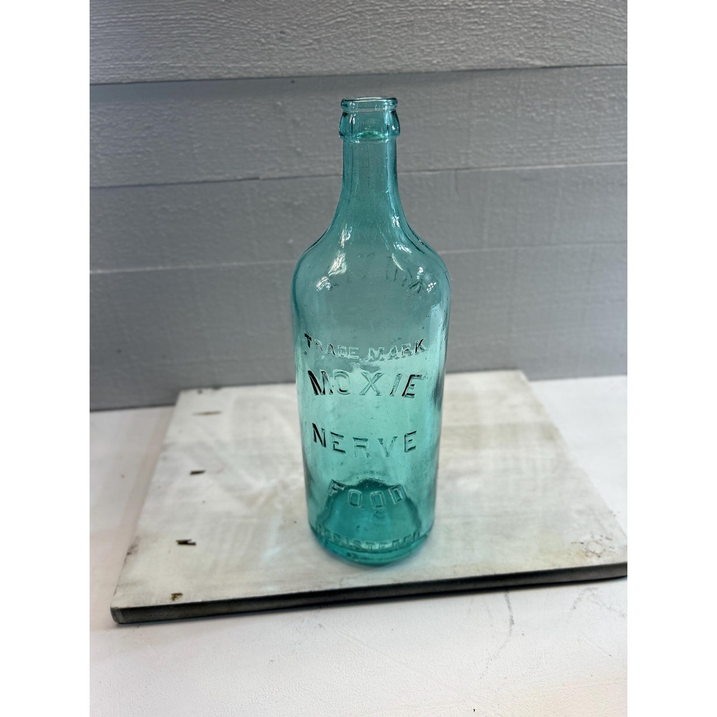 Antique 1880s Moxie Nerve Food Bottle – Aqua Blue Glass – Patent Medicine Soda Tonic Apothecary Collectible – Rare 12 Inch Embossed Bottle