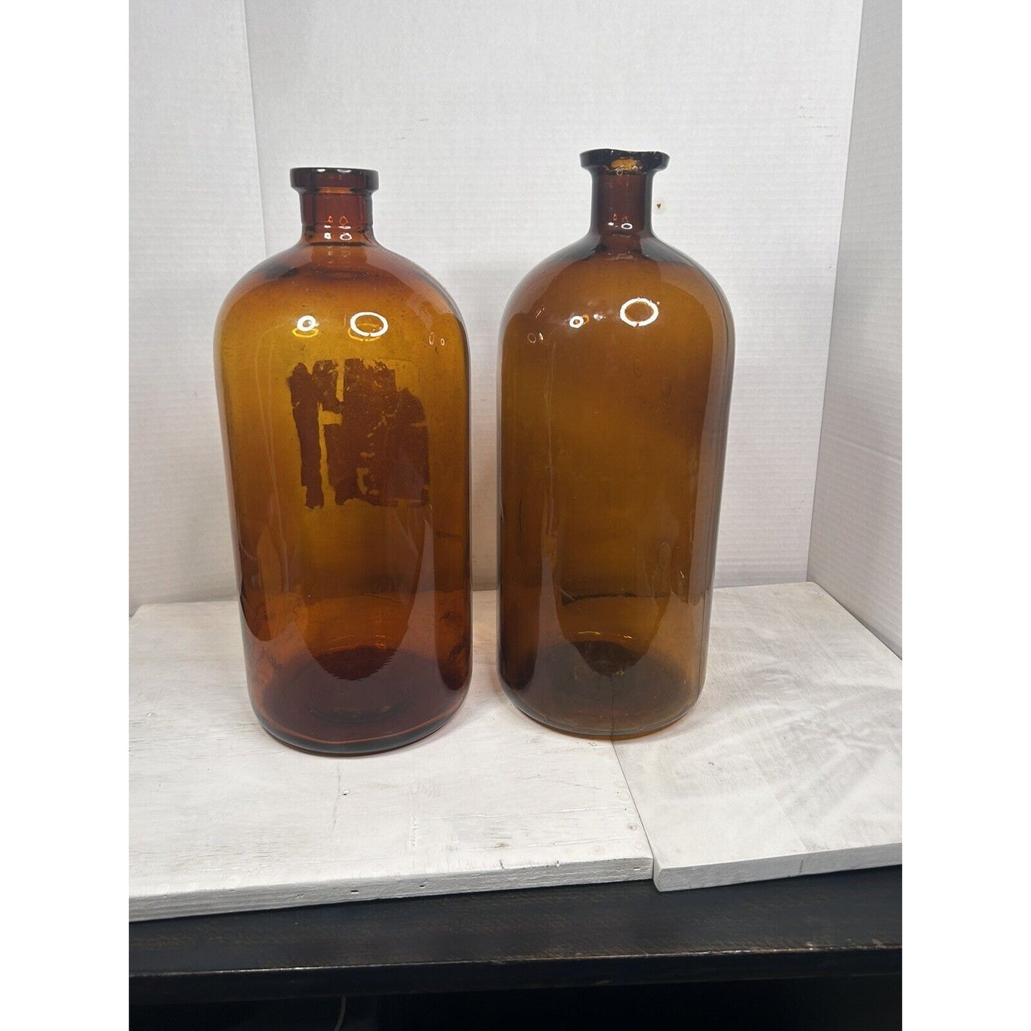Large brown glass apothecary pharmacy jars top view opening