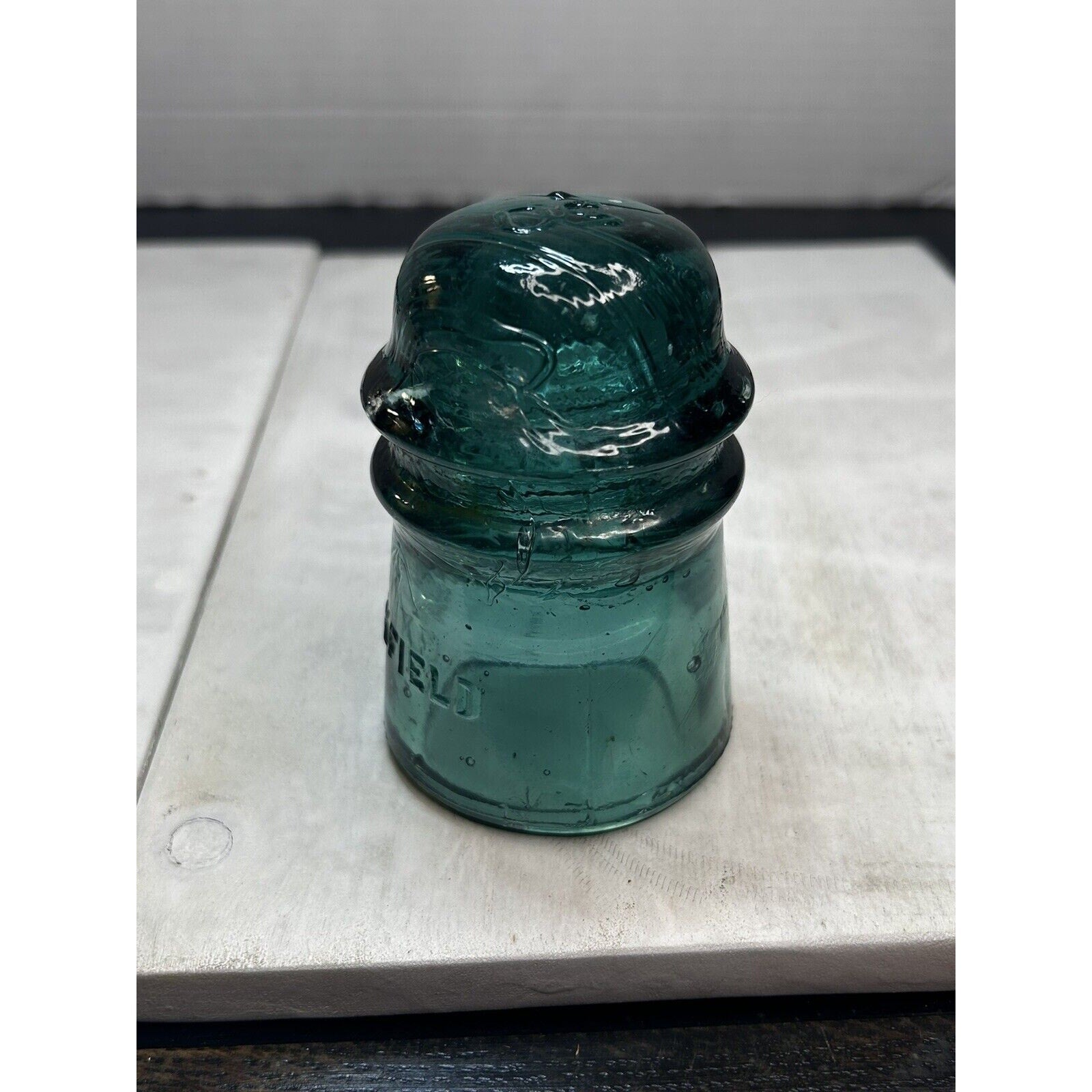 Vintage Brookfield green glass insulator top embossed crown