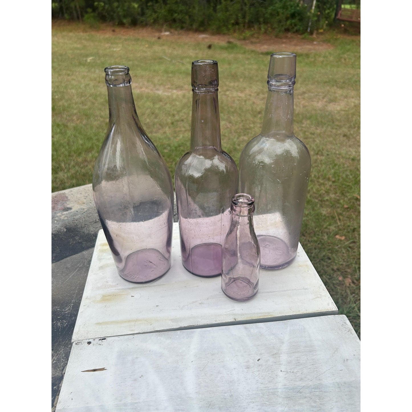 Set of 4 Antique Purple Glass Bottles Sun Co Early 1900s Hand Blown Apothecary Bottles Collectible Display