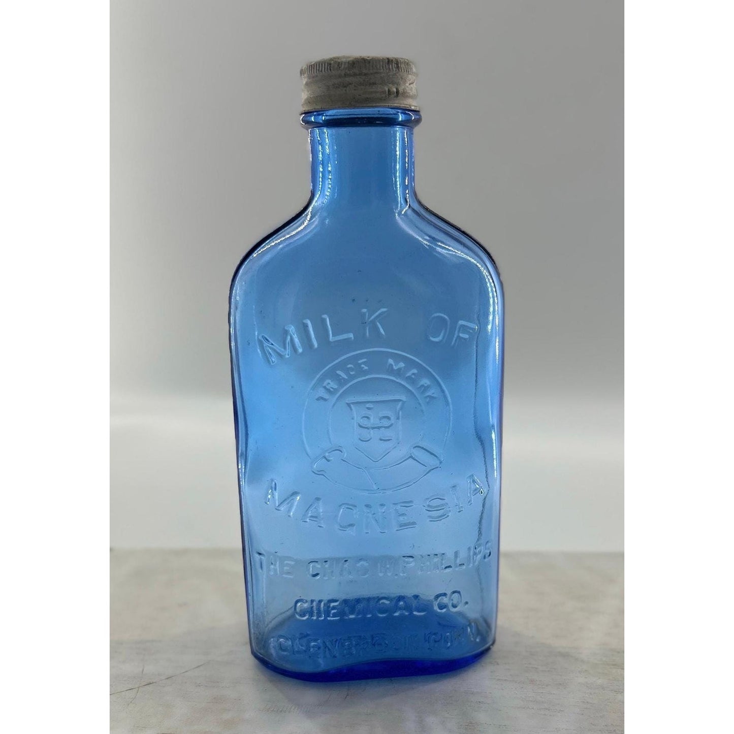 Antique Apothecary Milk of Magnesia Bottle c. 1910–1925 | Blue Glass Chas H Phillips Chemical Co. Cobalt blue apothecary bottle decor