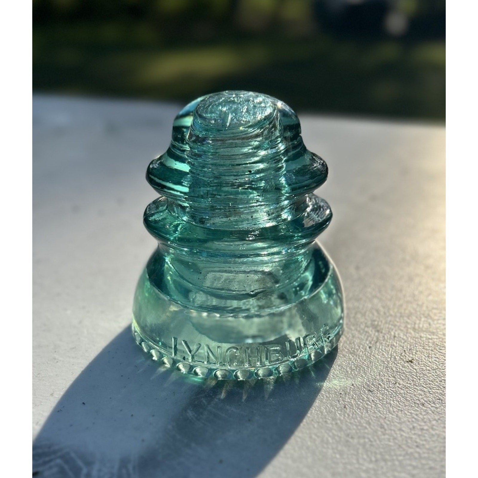 CD 154 Lynchburg No 44 ice blue glass insulator side view