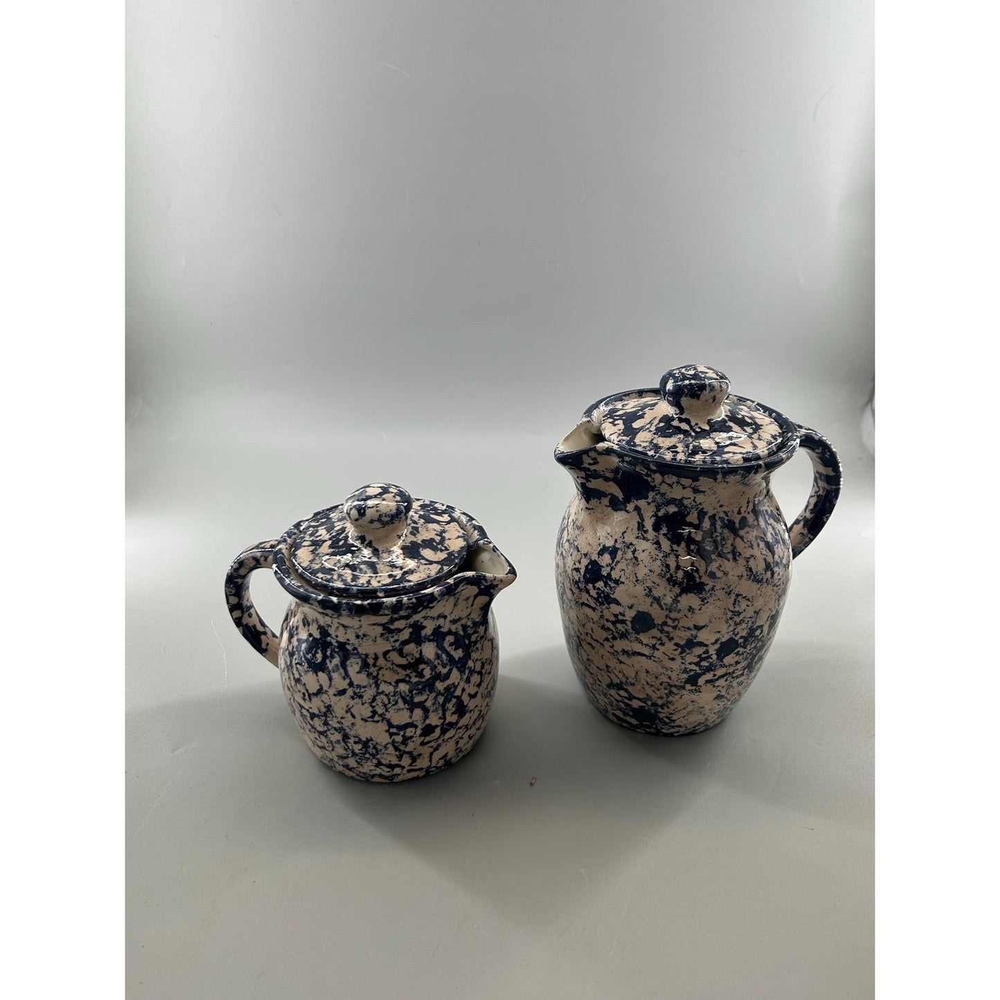 Blue spongeware stoneware pitcher set back view rustic