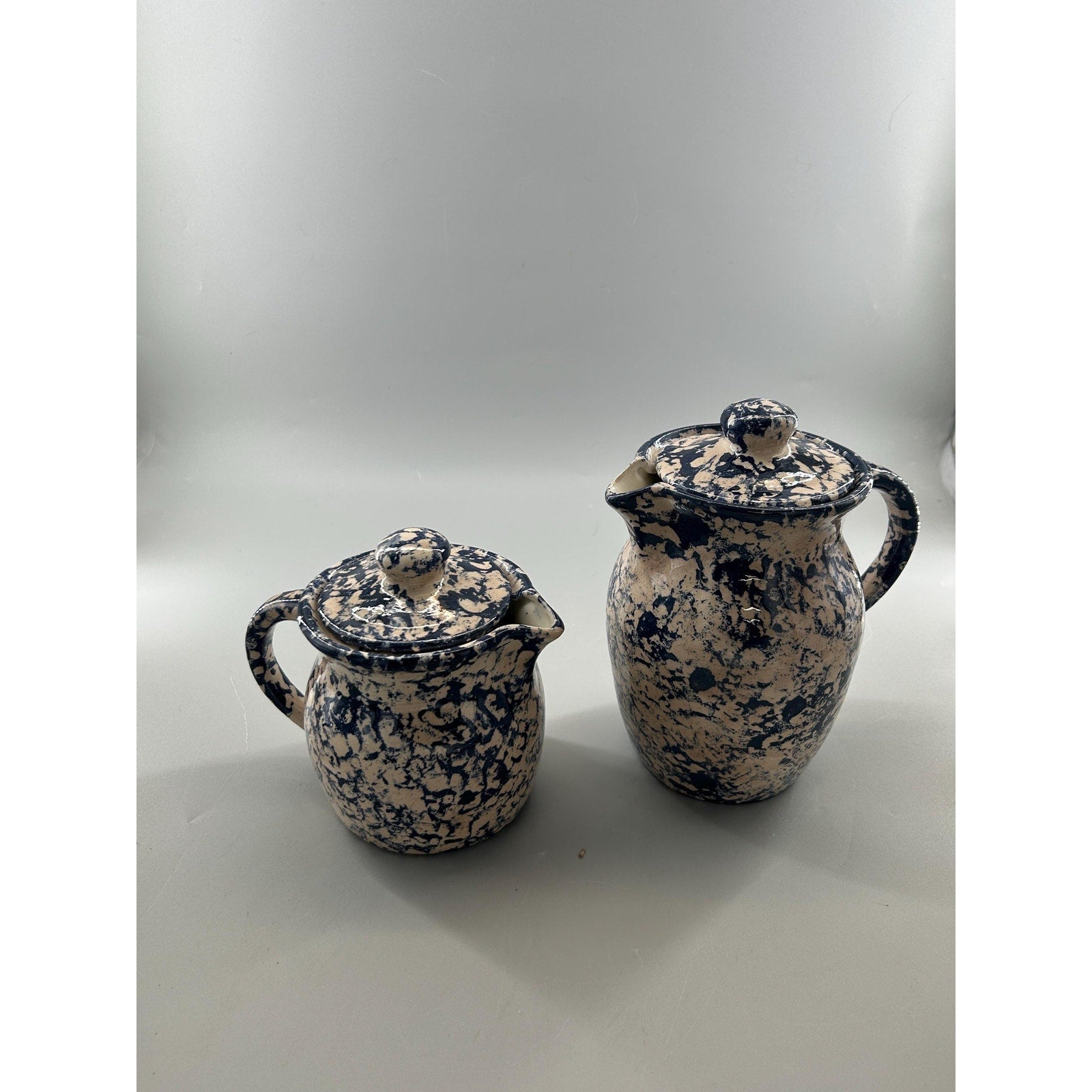 Blue spongeware stoneware pitcher set back view rustic