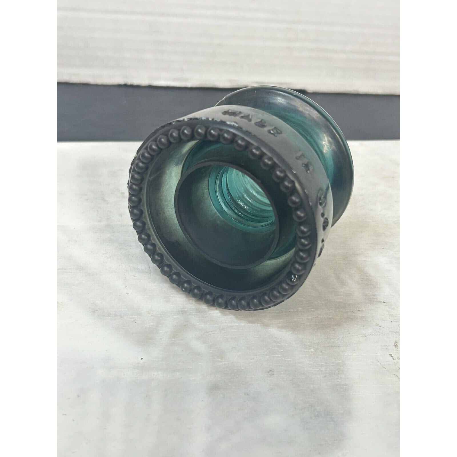 Hemingray No 20 dark green glass insulator back view