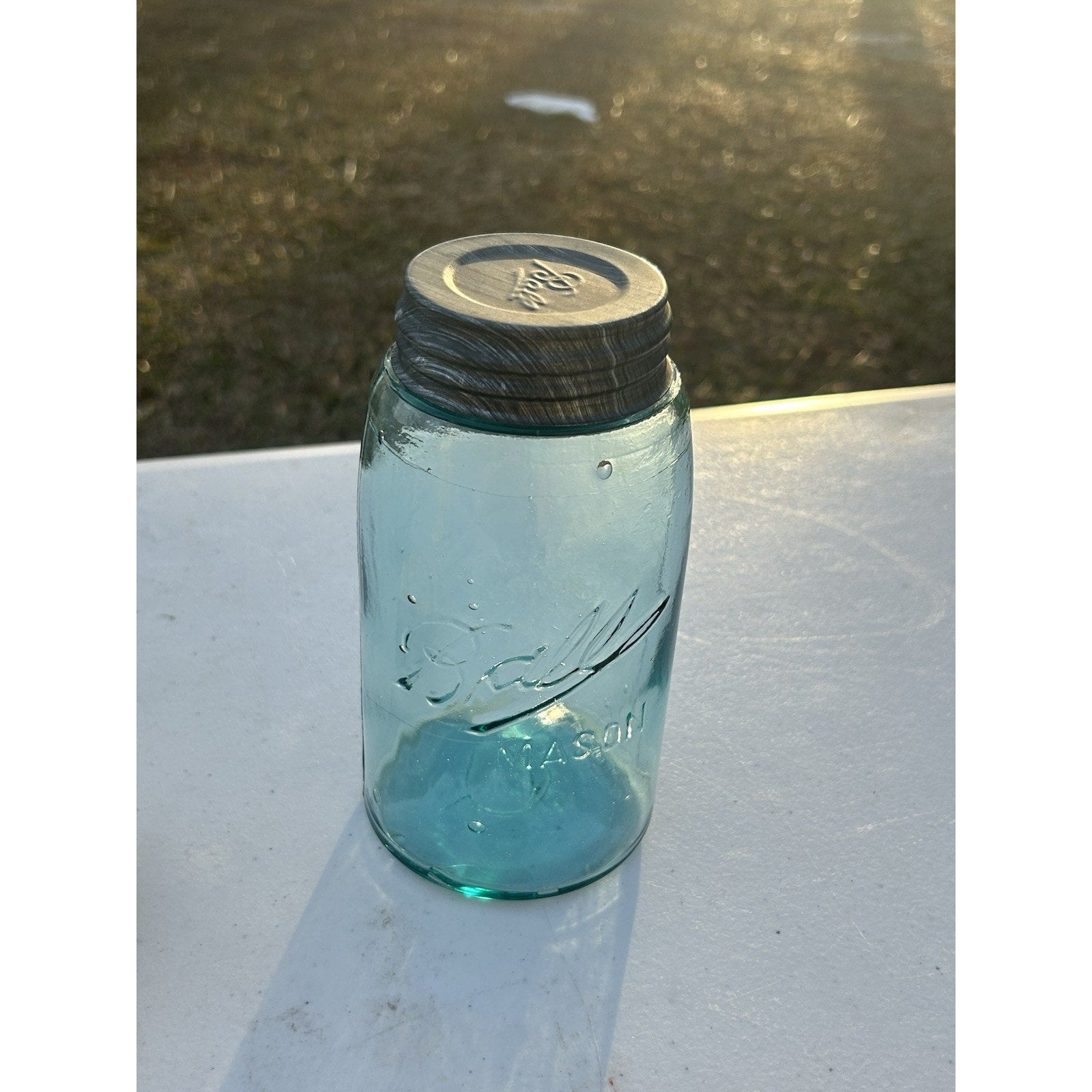 Antique Ball Triple-L mason jar condition detail — no chips, clean interior, early American canning glass