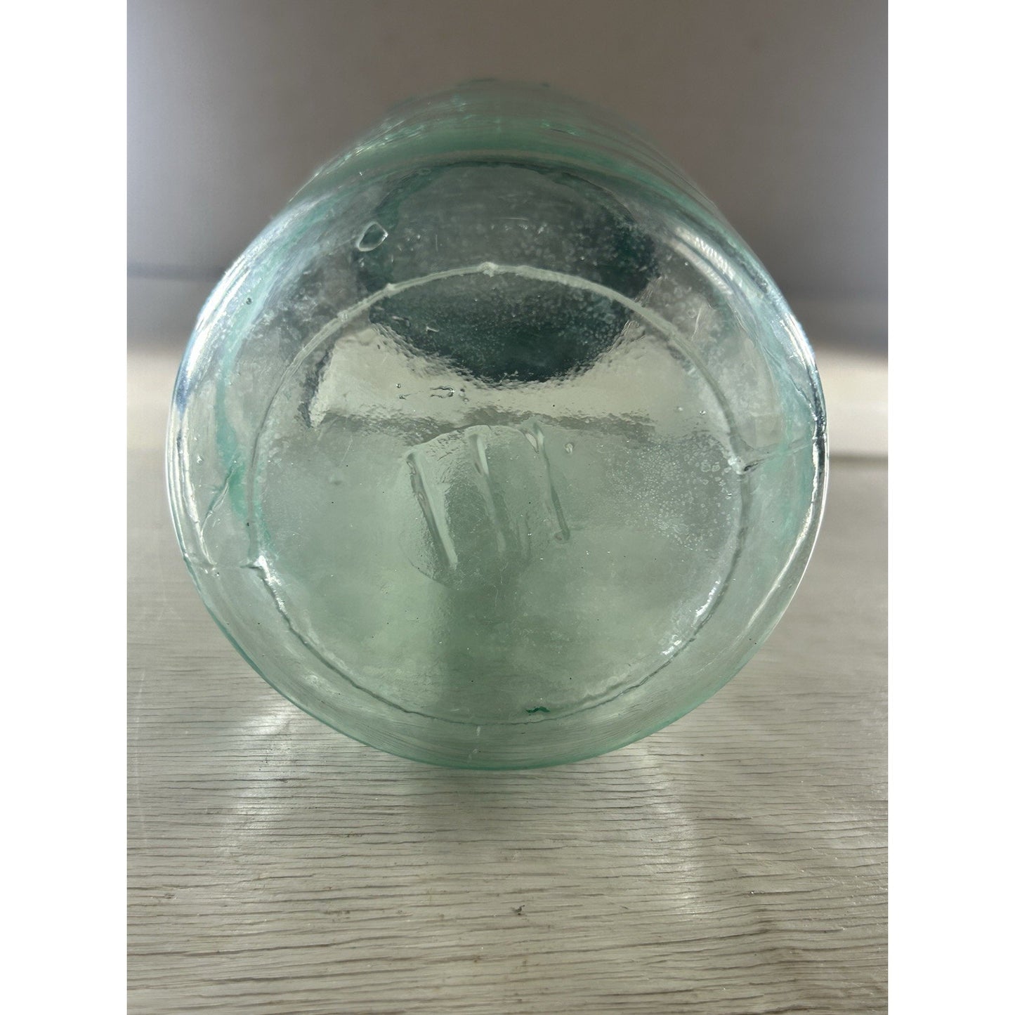 1858 Mason's Patent jar seam detail — mold seam running through aqua glass body