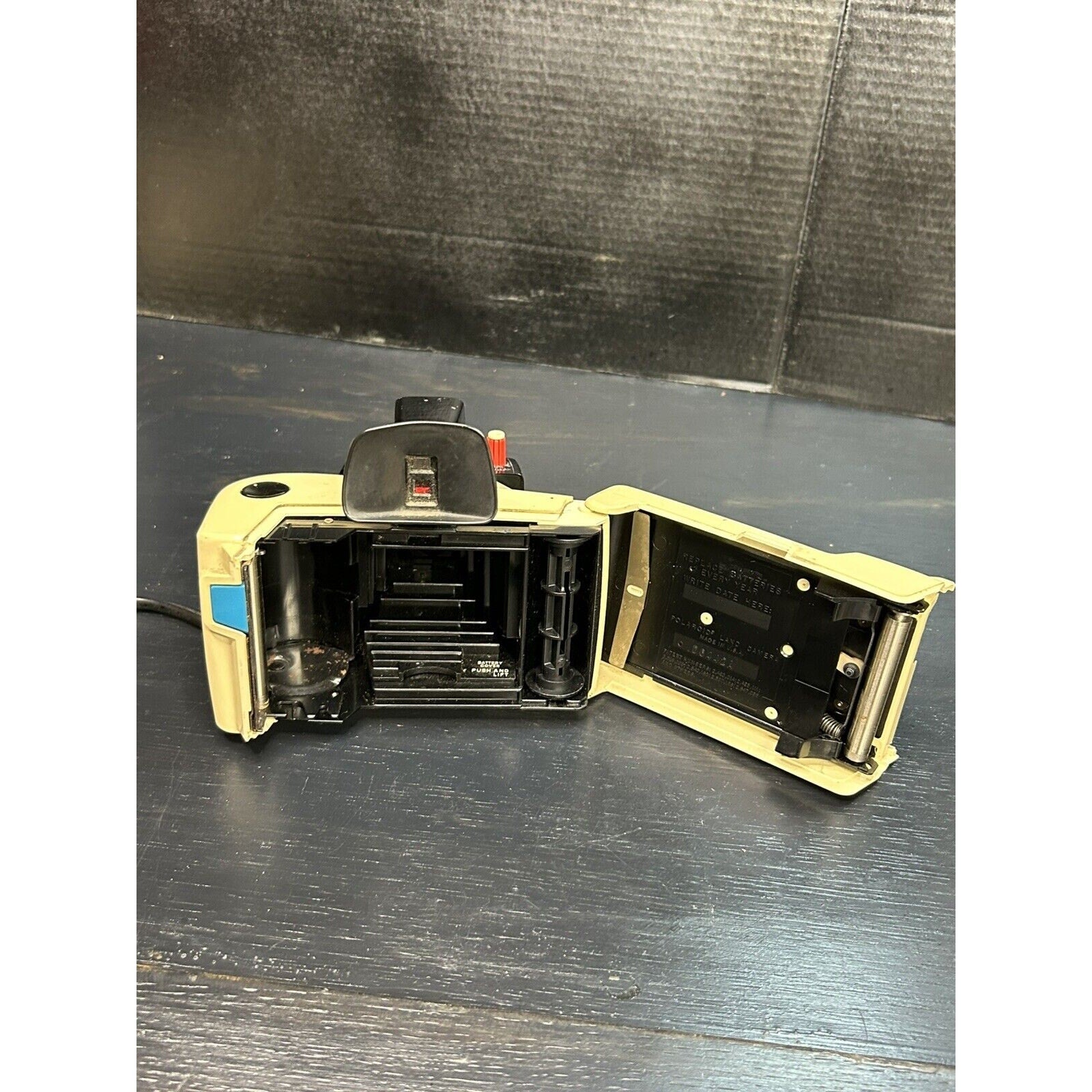 Polaroid Swinger 20 1960s camera all angles display
