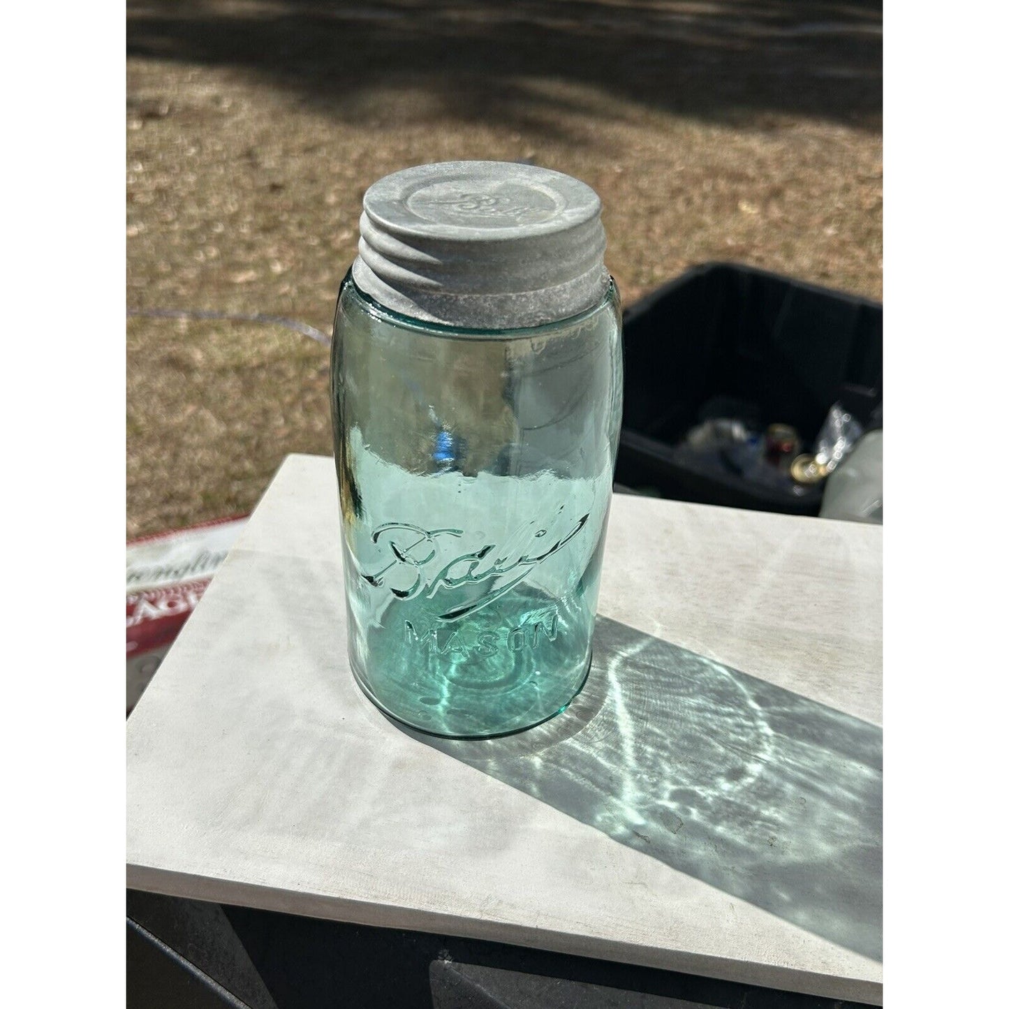Antique Ball Triple-L mason jar 1900-1910 — additional angle showing aqua glass color and air bubble