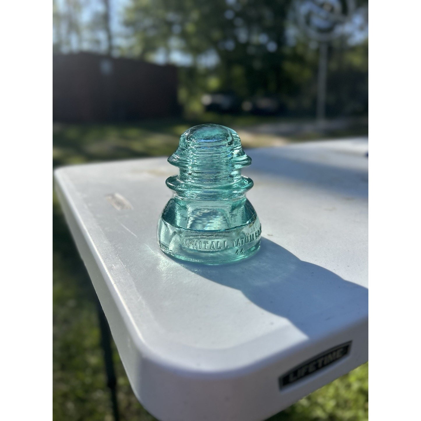 Whitall Tatum Co No 1 ice blue glass insulator base condition detail