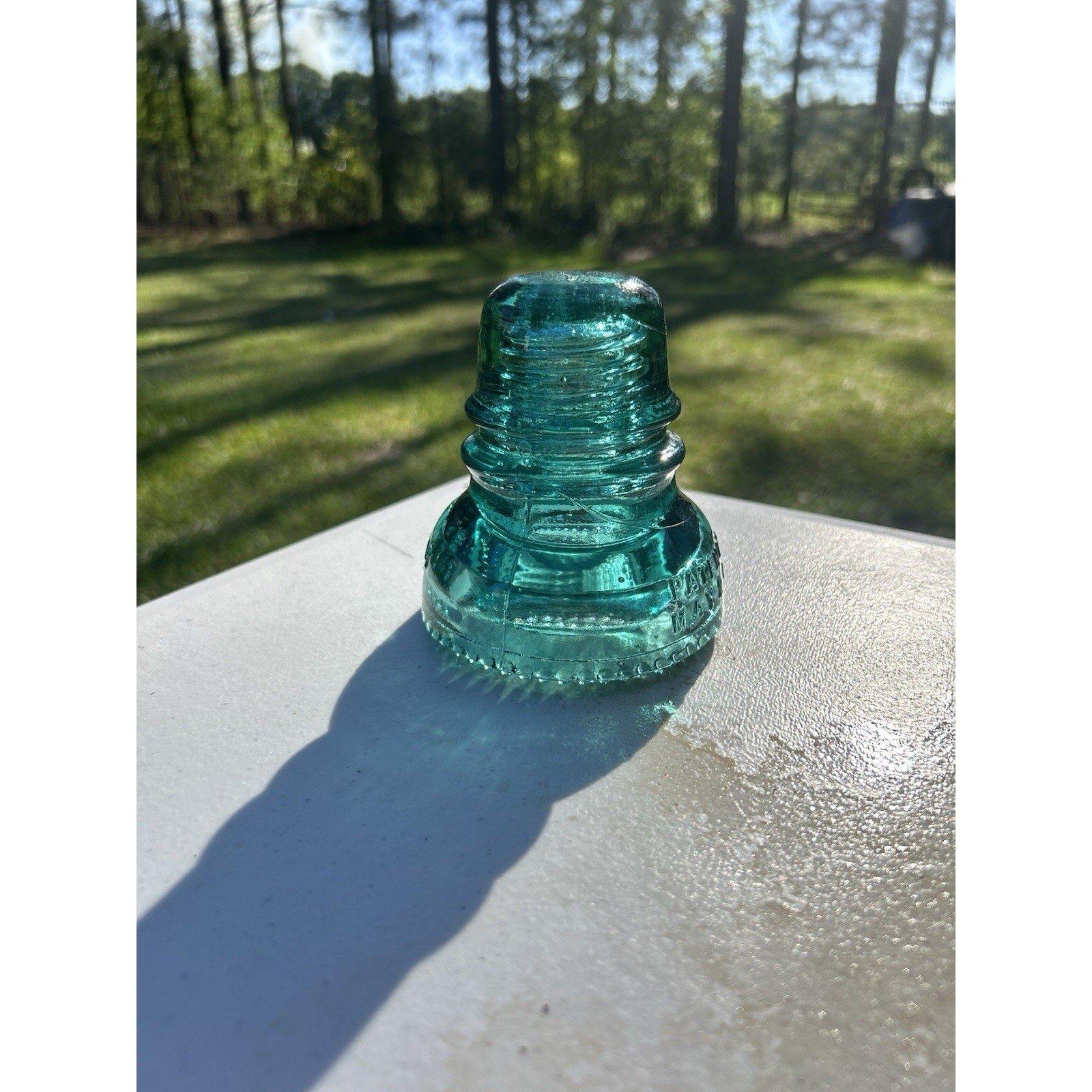 Hemingray petticoat 1893 aqua insulator light transparency color