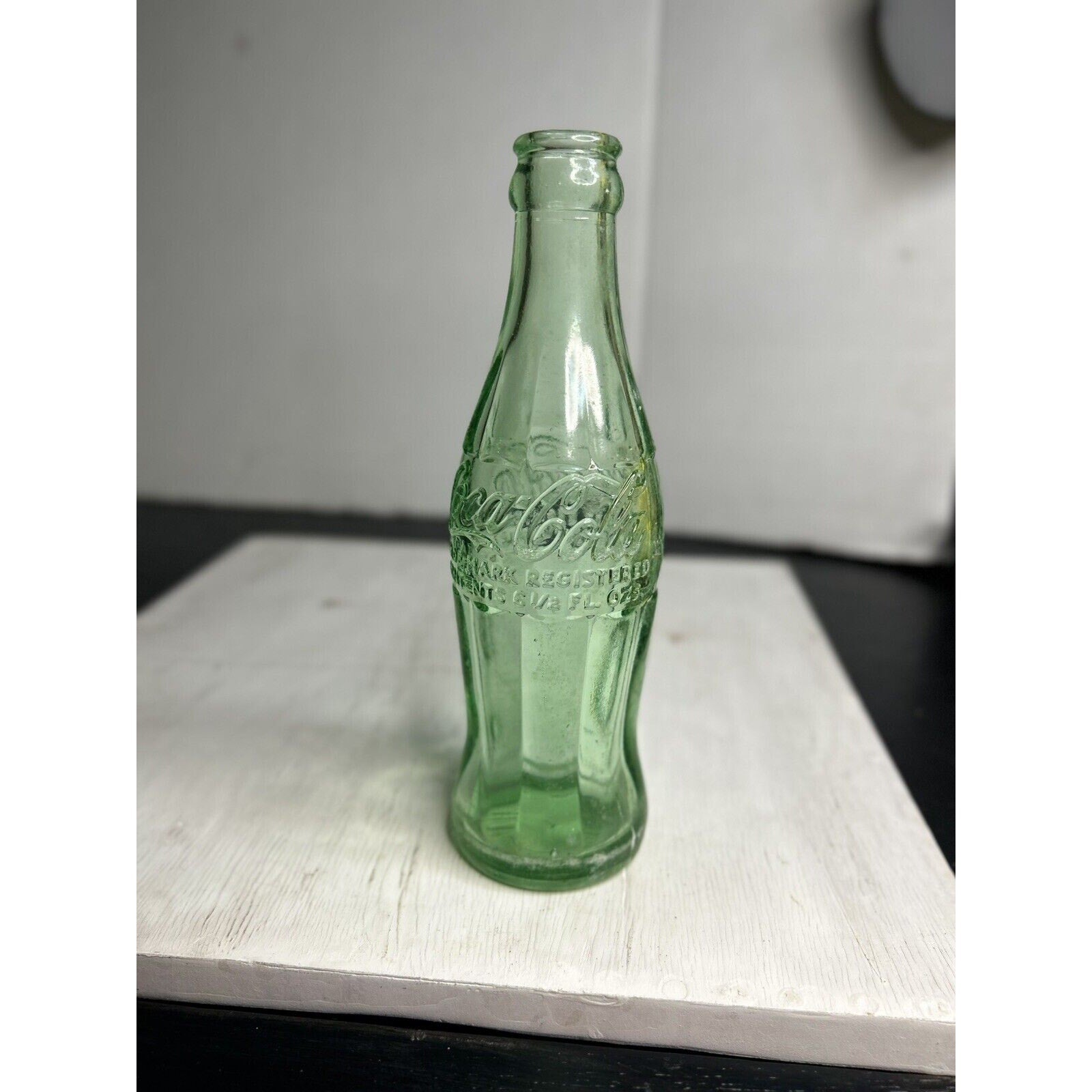 1959 Coca-Cola Suffolk VA hobbleskirt bottle back view