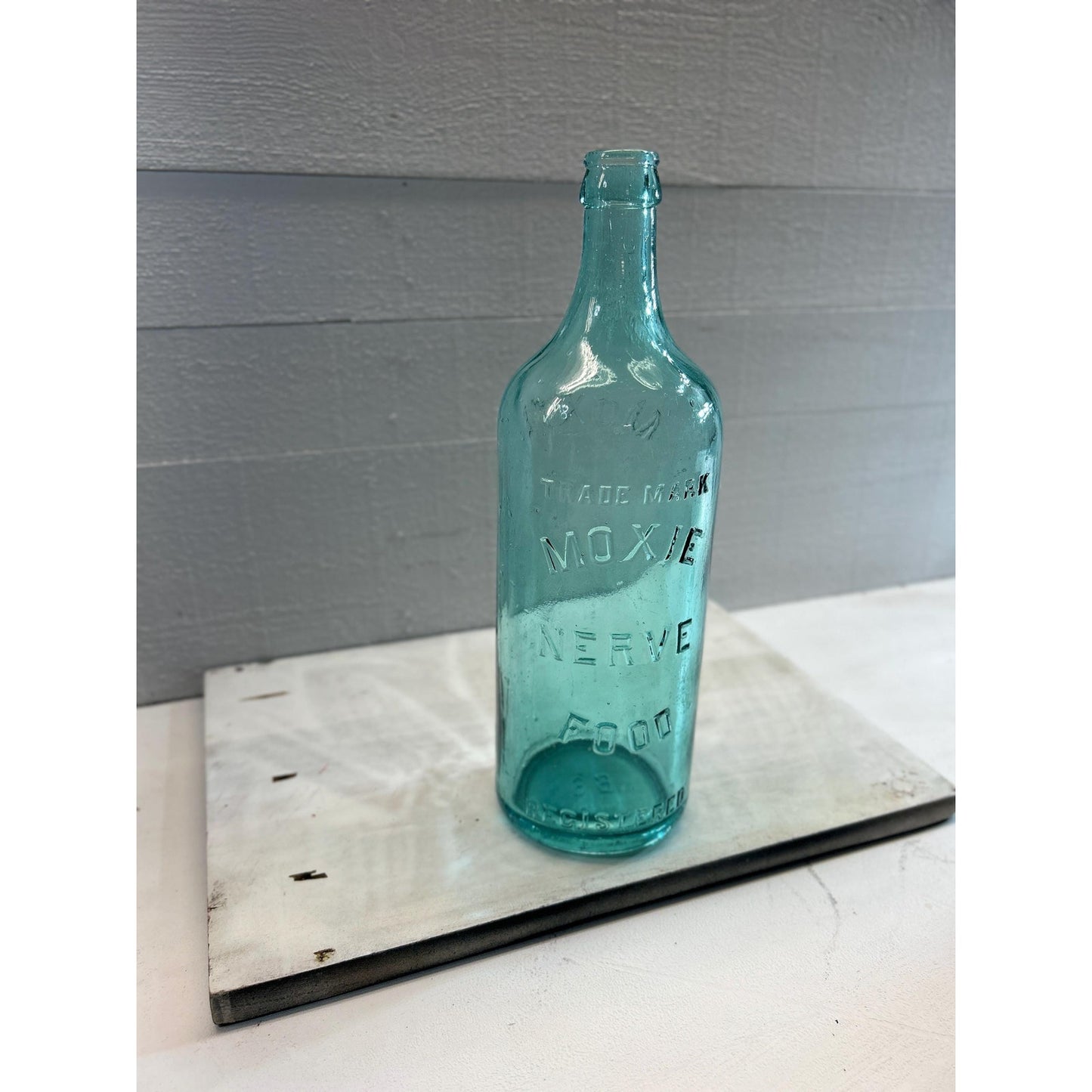Antique 1880s Moxie Nerve Food Bottle – Aqua Blue Glass – Patent Medicine Soda Tonic Apothecary Collectible – Rare 12 Inch Embossed Bottle