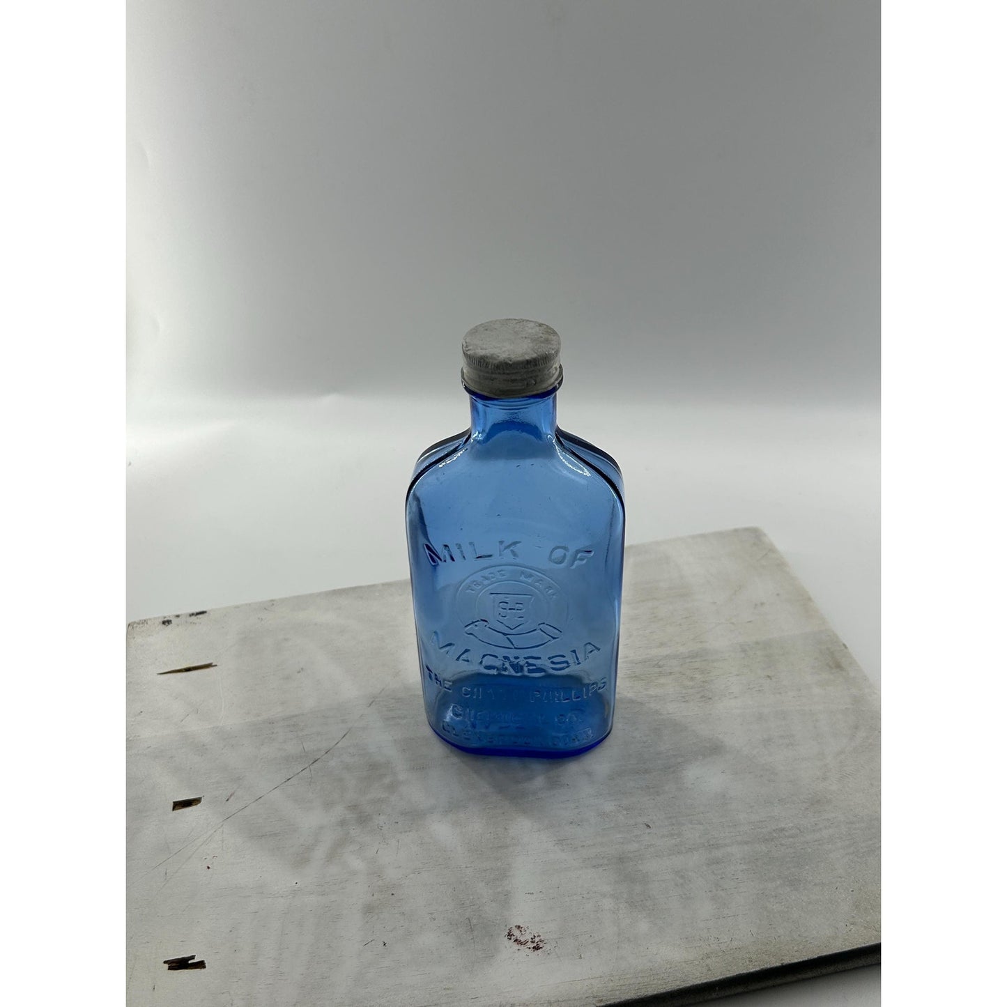 Antique Apothecary Milk of Magnesia Bottle c. 1910–1925 | Blue Glass Chas H Phillips Chemical Co. Cobalt blue apothecary bottle decor