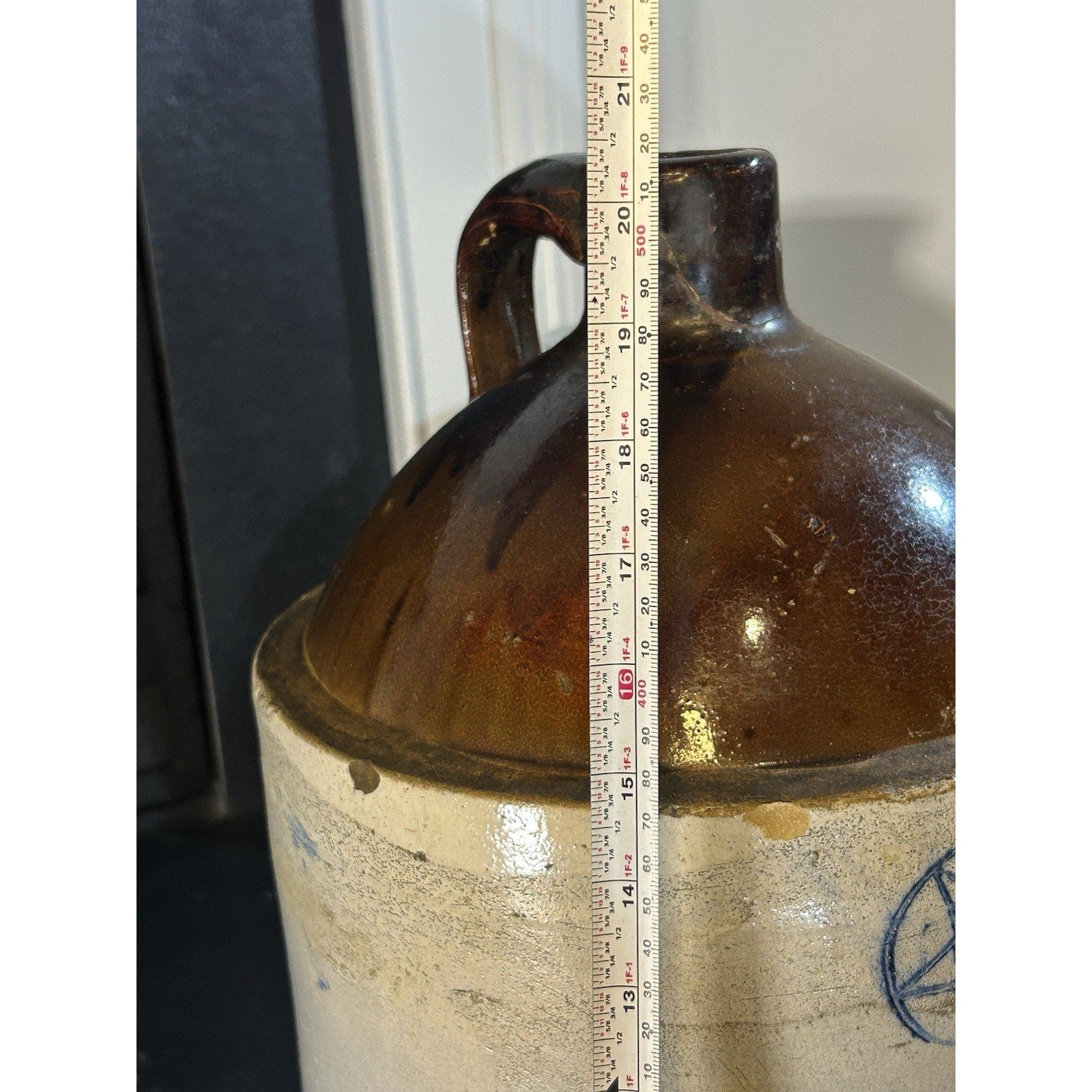 Antique stoneware crock jug 5 gallon blue star marking close-up