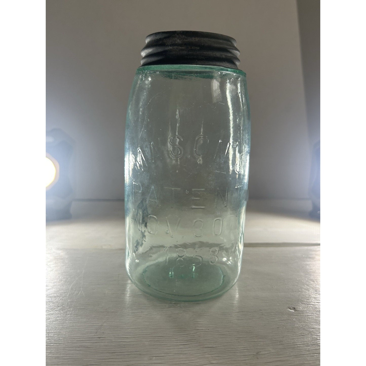 Mason's Patent 1858 jar base — showing early mold construction and glass base condition