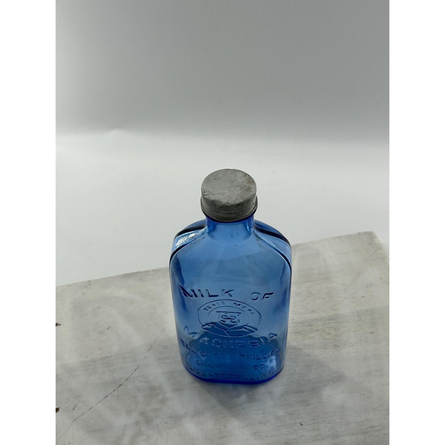 Antique Apothecary Milk of Magnesia Bottle c. 1910–1925 | Blue Glass Chas H Phillips Chemical Co. Cobalt blue apothecary bottle decor