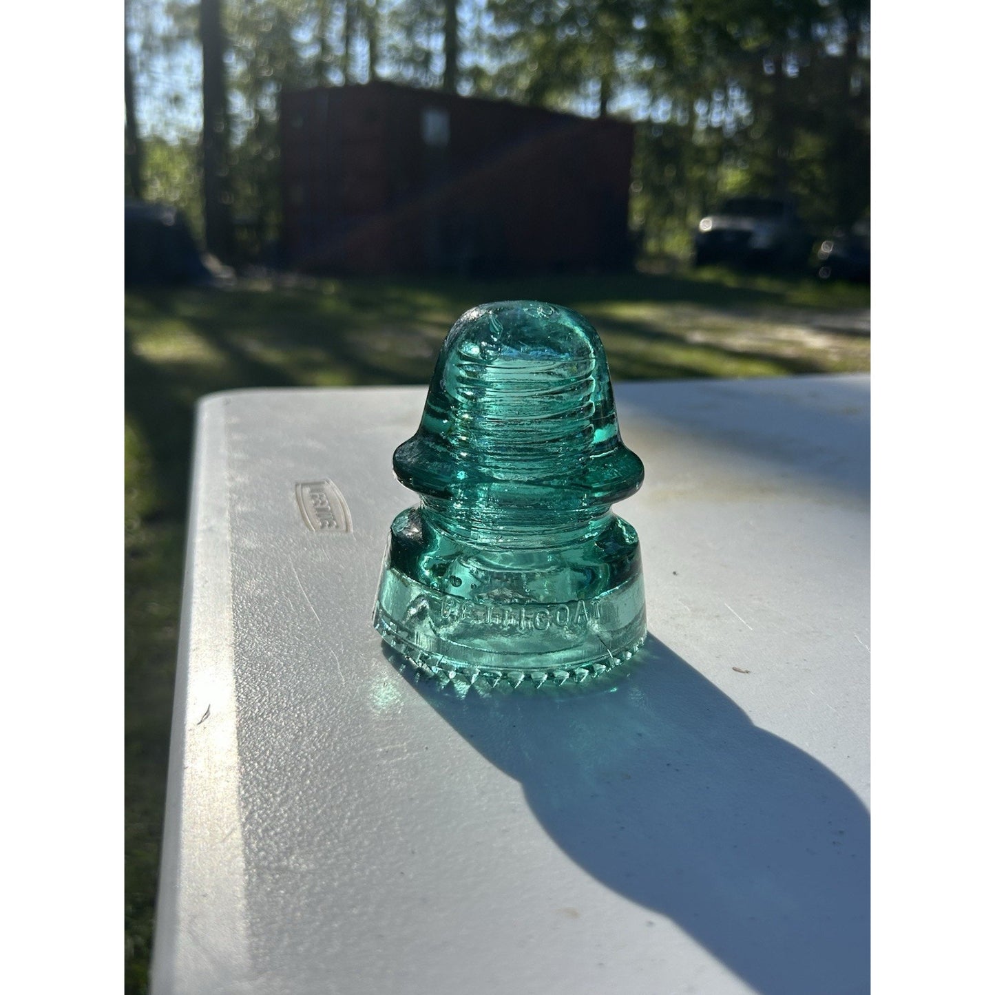 H.G. Co Petticoat green glass insulator Pat May 2 1893 side view