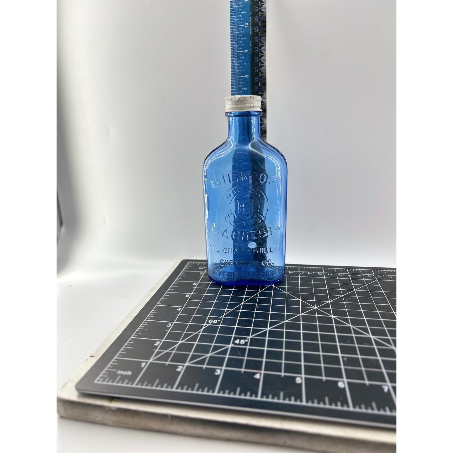 Antique Apothecary Milk of Magnesia Bottle c. 1910–1925 | Blue Glass Chas H Phillips Chemical Co. Cobalt blue apothecary bottle decor
