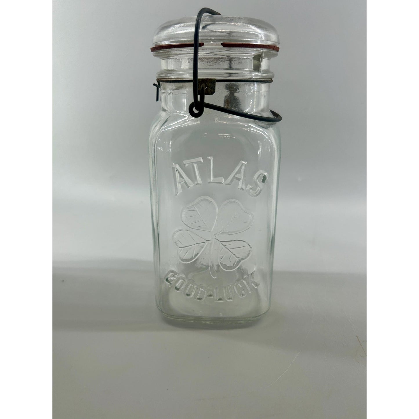 Atlas Good Luck Clover Quart Mason Jar Original Wire Bail Glass Lid Antique Hazel Atlas 1920s. With original gasket . Incredible condition.