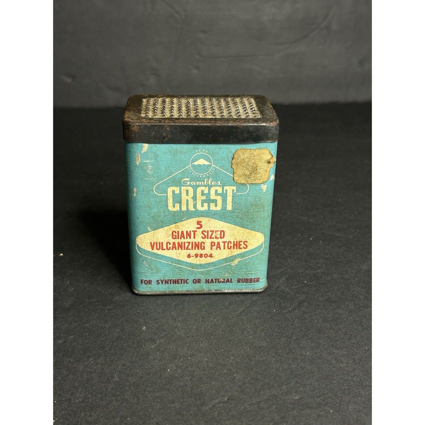 Crest vulcanized tire patch advertising tin back view