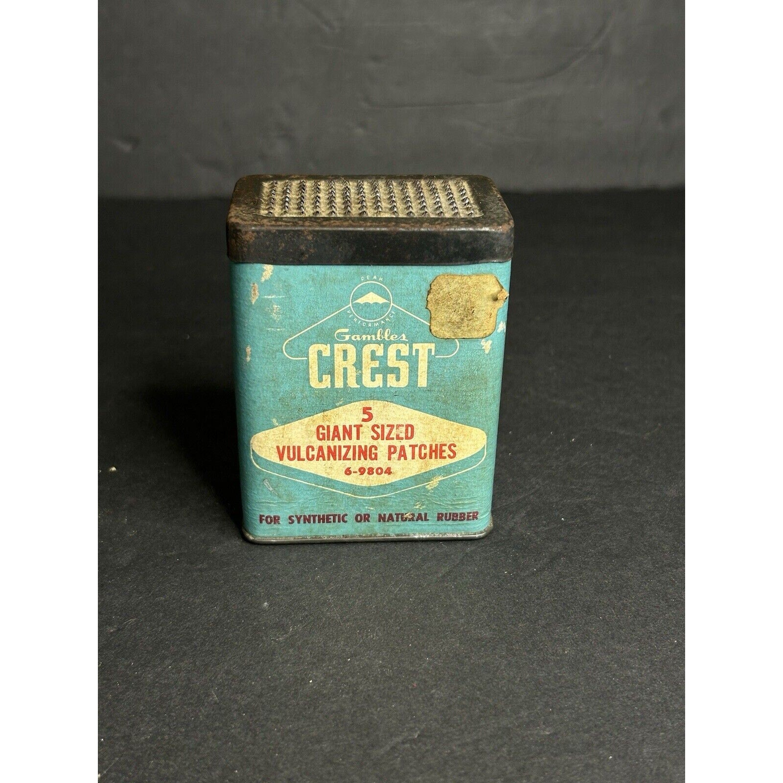 Crest vulcanized tire patch advertising tin back view