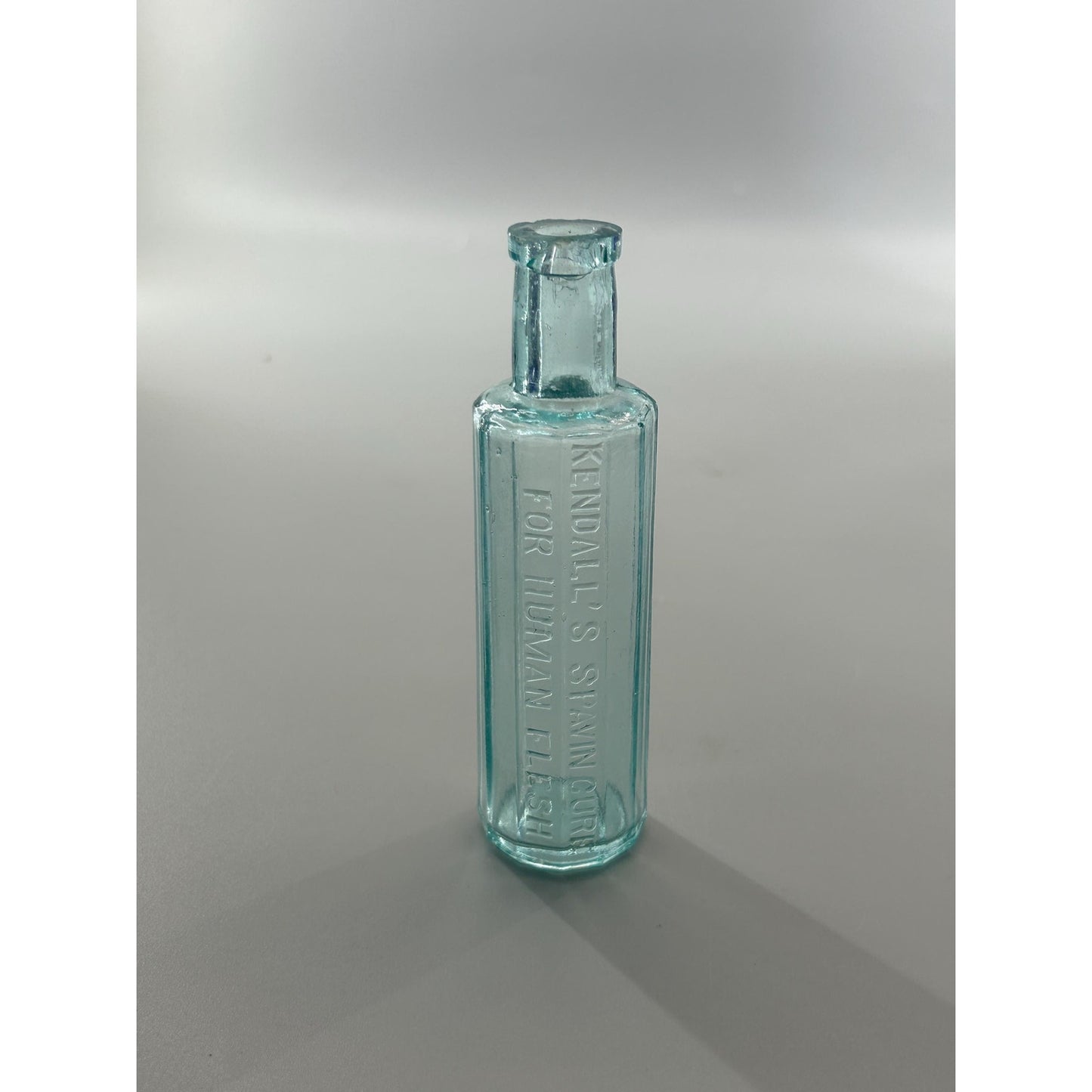 Antique Kendall’s Spavin Cure For Human Flesh Bottle – Aqua Glass Embossed Patent Medicine c1900