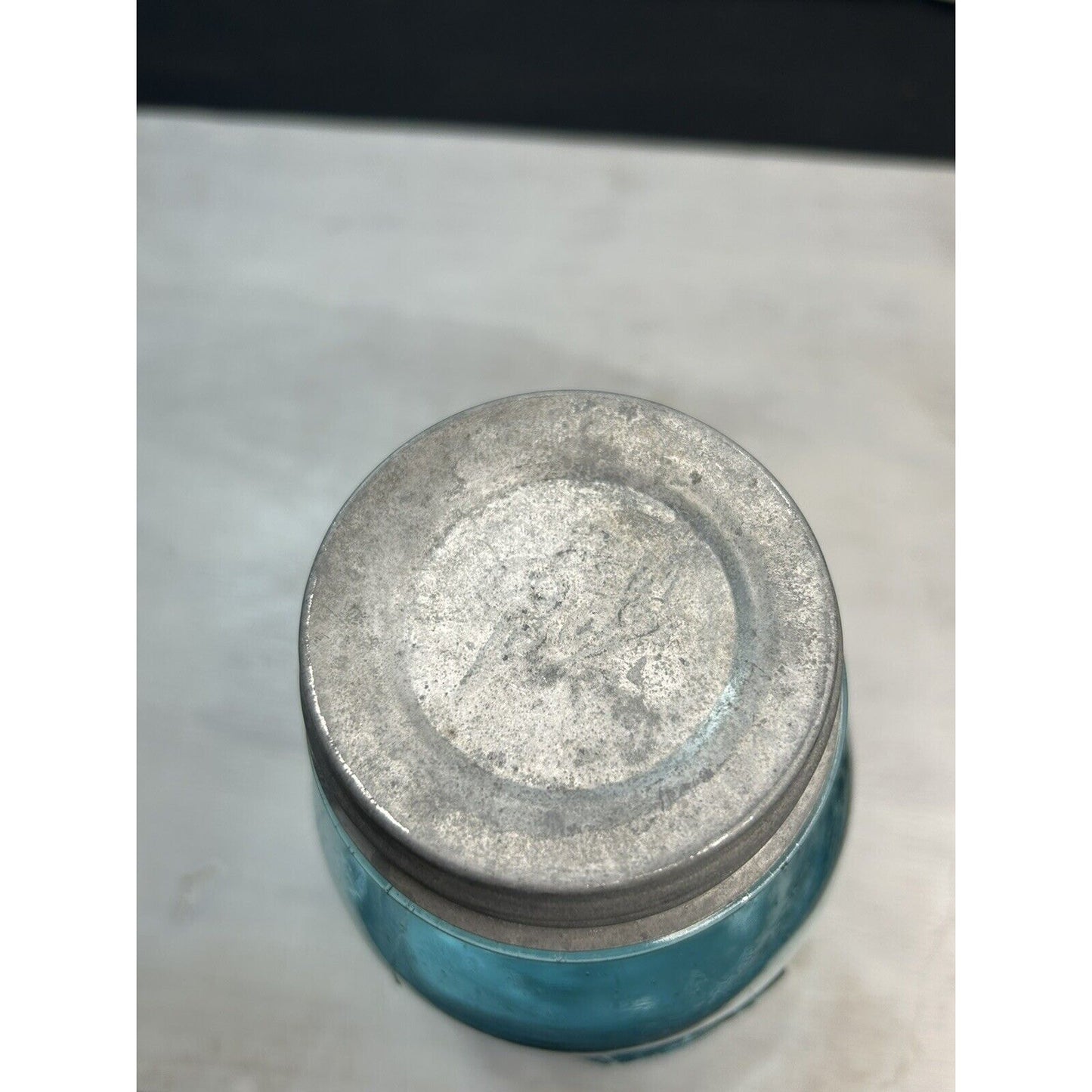 Ball Perfect Mason offset variant quart jar — scale reference with lid seated, early 20th century canning glass