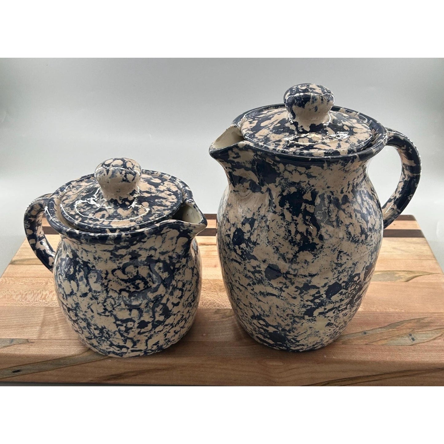 Vintage blue spongeware pitcher creamer lids detail