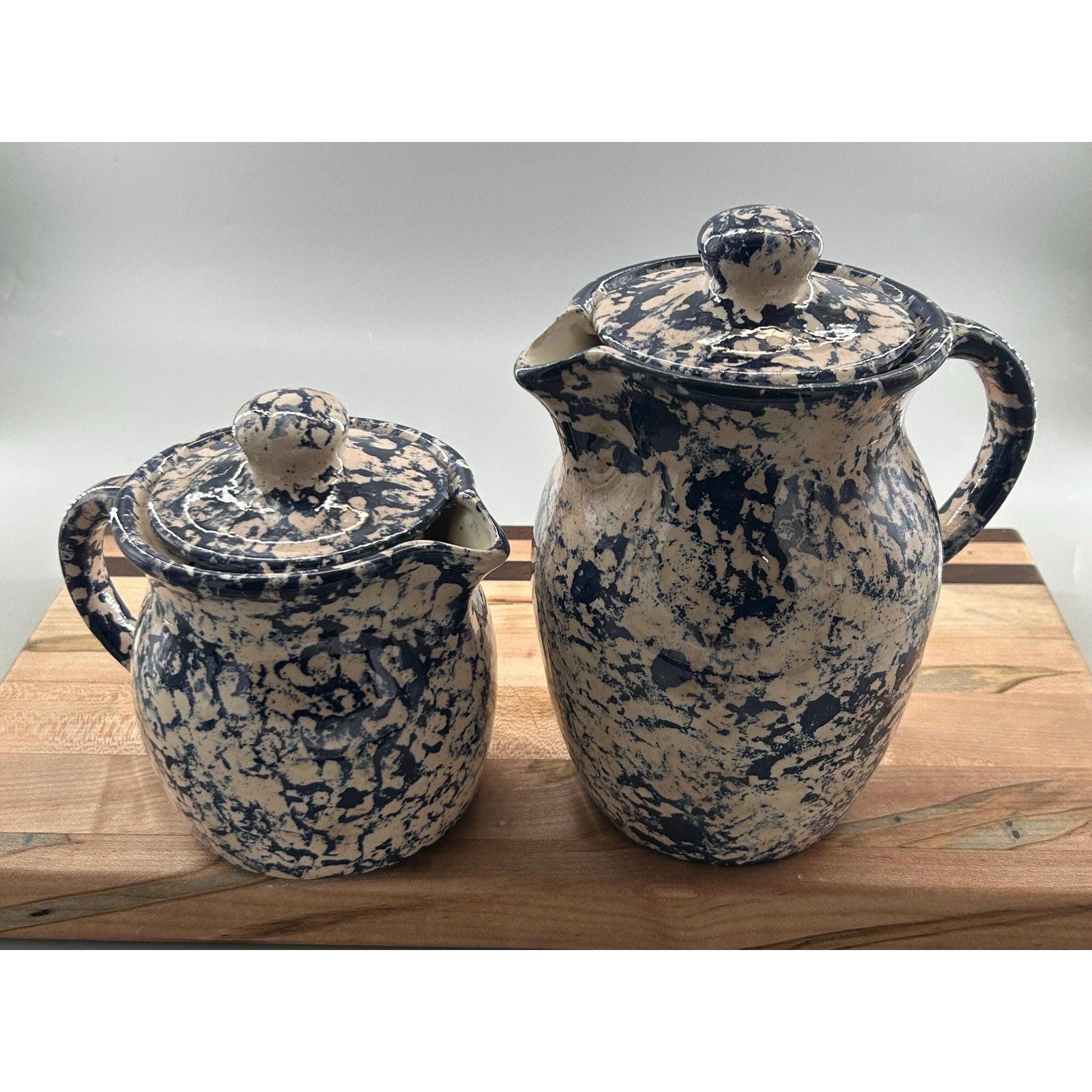Vintage blue spongeware pitcher creamer lids detail