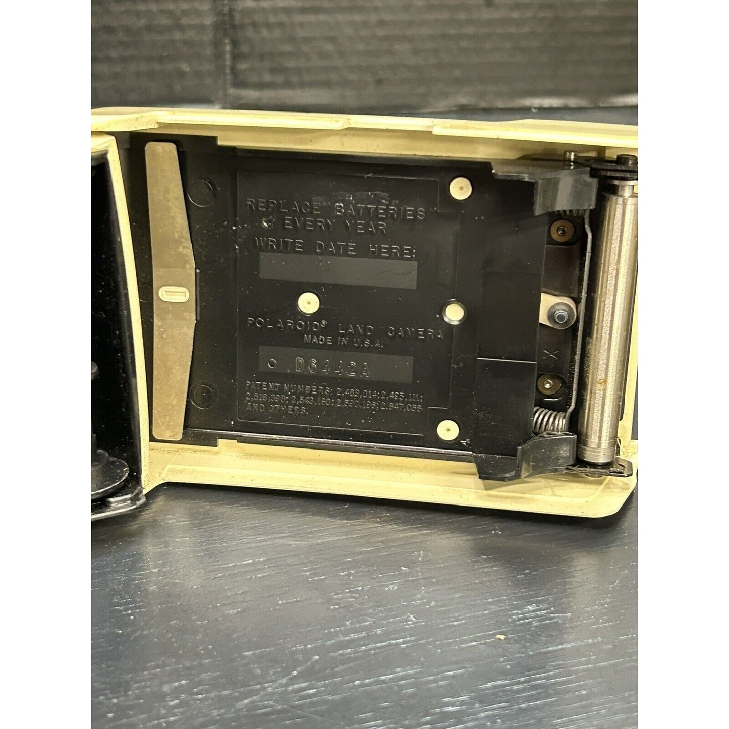 Vintage Polaroid Swinger camera Made USA full profile