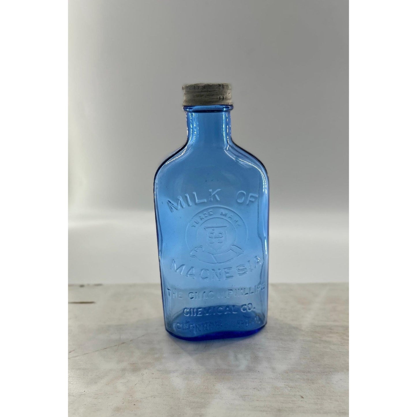 Antique Apothecary Milk of Magnesia Bottle c. 1910–1925 | Blue Glass Chas H Phillips Chemical Co. Cobalt blue apothecary bottle decor