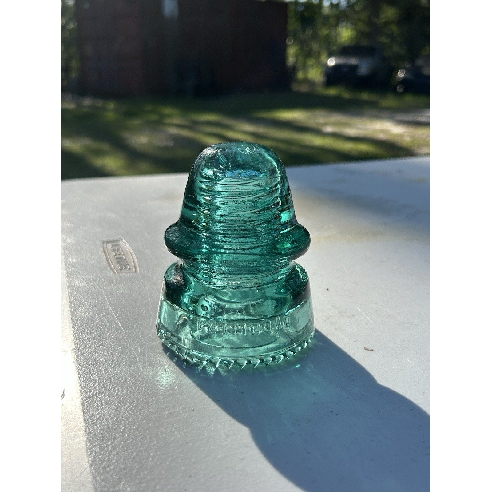 Pristine H.G. Co green petticoat insulator 1893 crown top detail