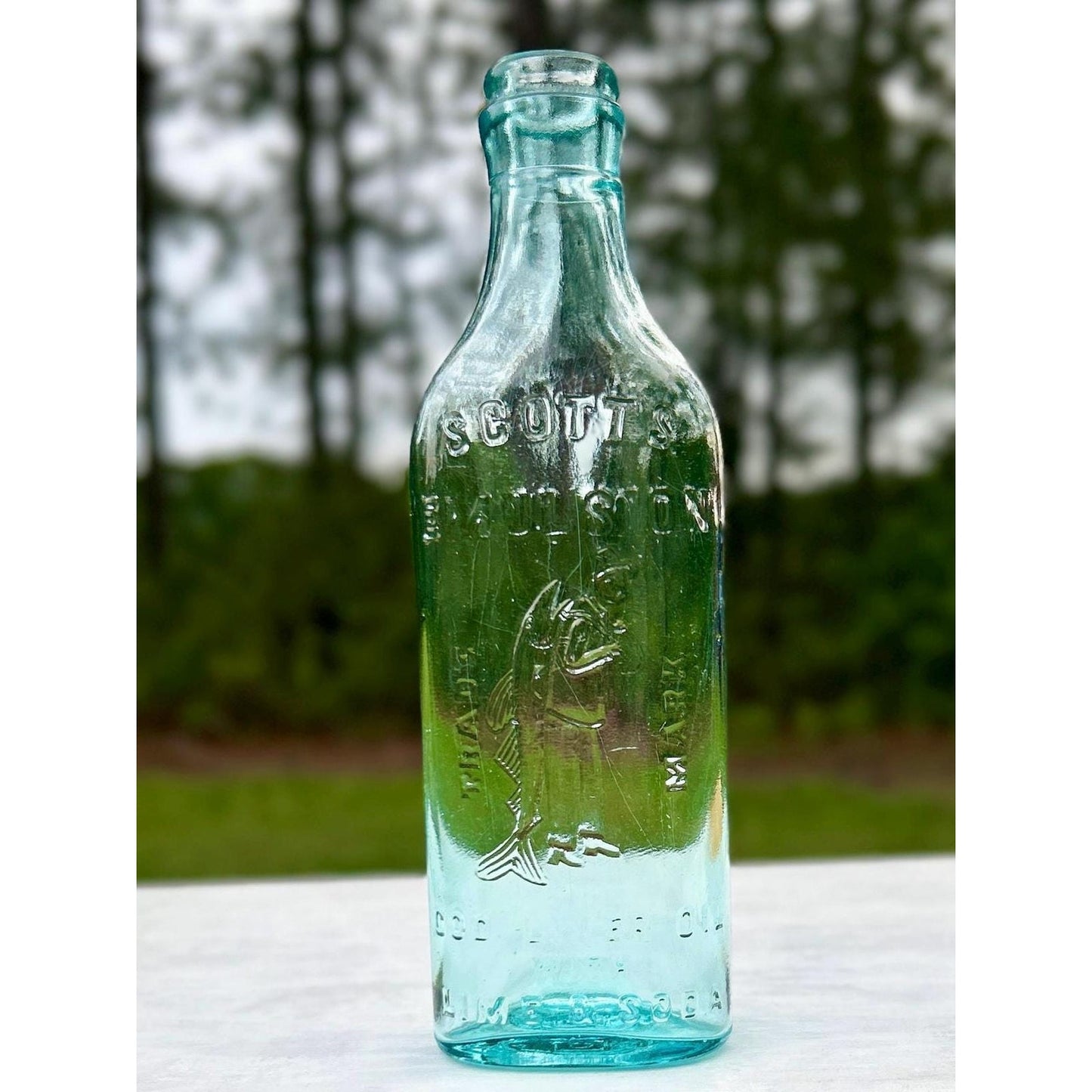 Antique Scott’s Emulsion Aqua Blue Cod Liver Oil With Lime & Soda Bottle Embossed Fisherman Patent Medicine