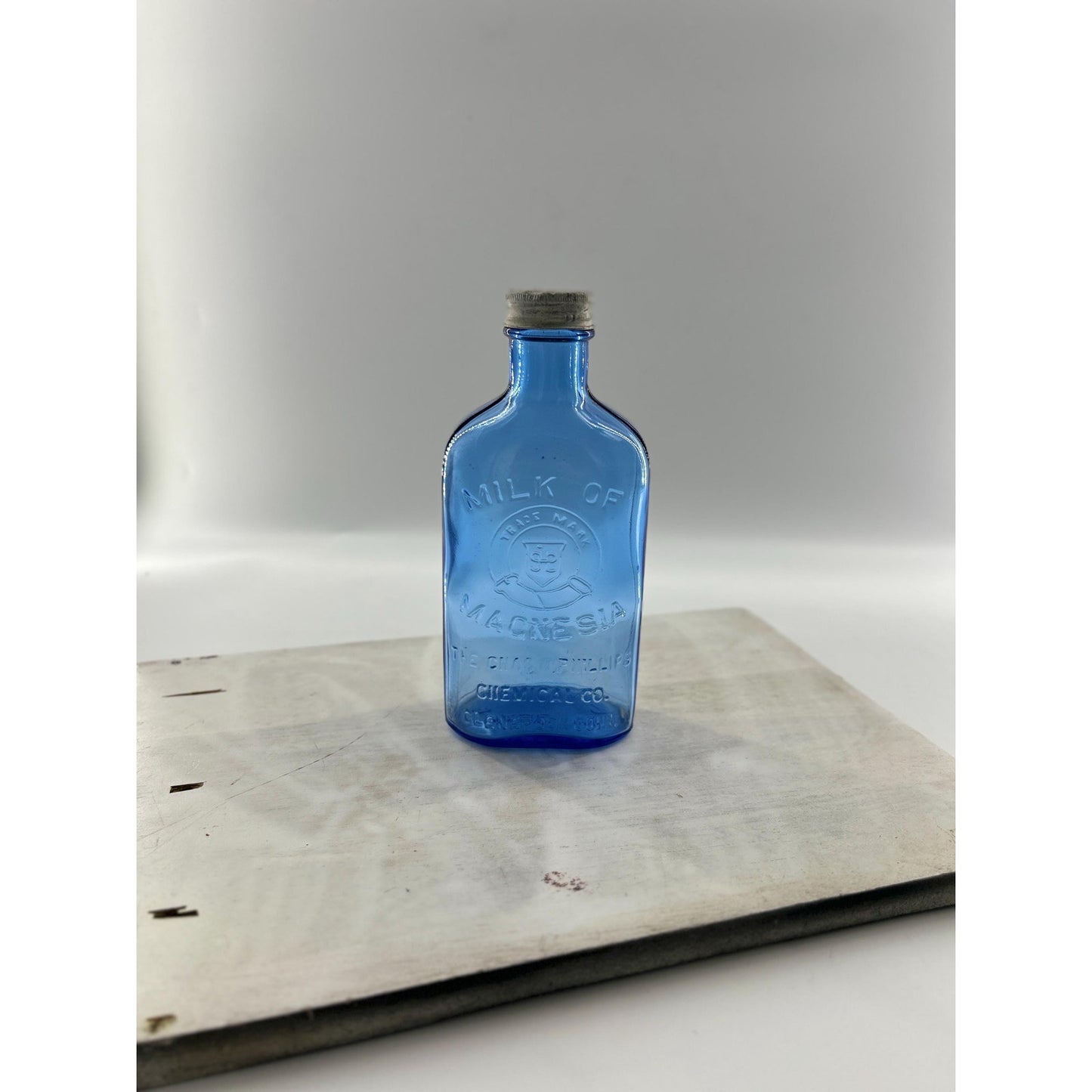 Antique Apothecary Milk of Magnesia Bottle c. 1910–1925 | Blue Glass Chas H Phillips Chemical Co. Cobalt blue apothecary bottle decor