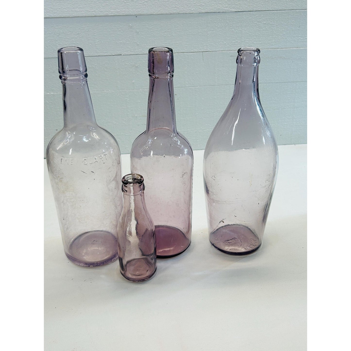 Set of 4 Antique Purple Glass Bottles Sun Co Early 1900s Hand Blown Apothecary Bottles Collectible Display