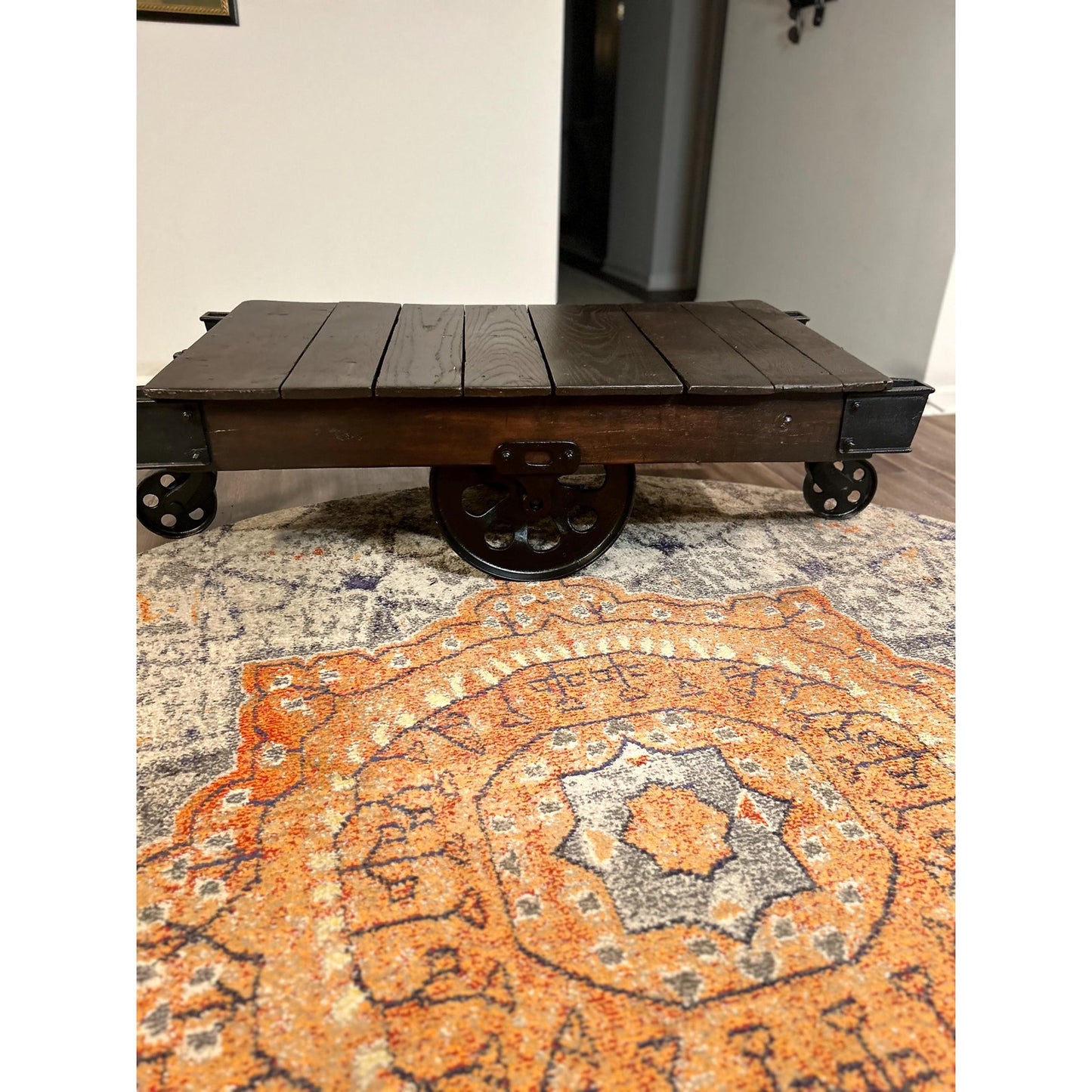 Restored Lineberry factory cart in farmhouse interior setting — industrial coffee table