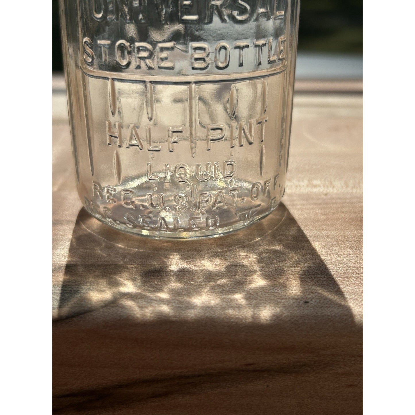 Vintage milk bottle Universal Store 5 cent deposit overall