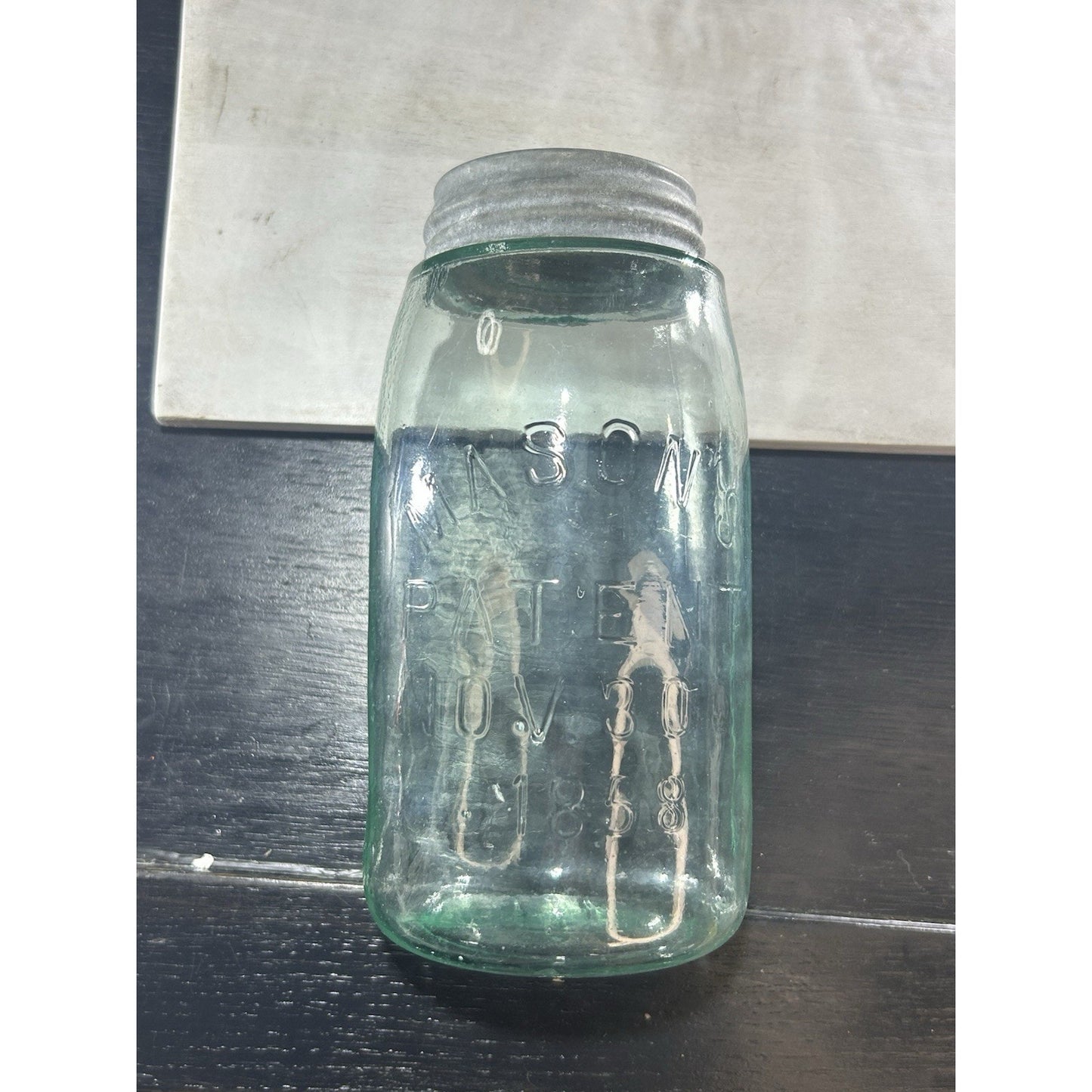 Antique Mason’s Patent Nov 30 1858 canning jar — light blue glass with seed bubbles, detail of embossed patent date