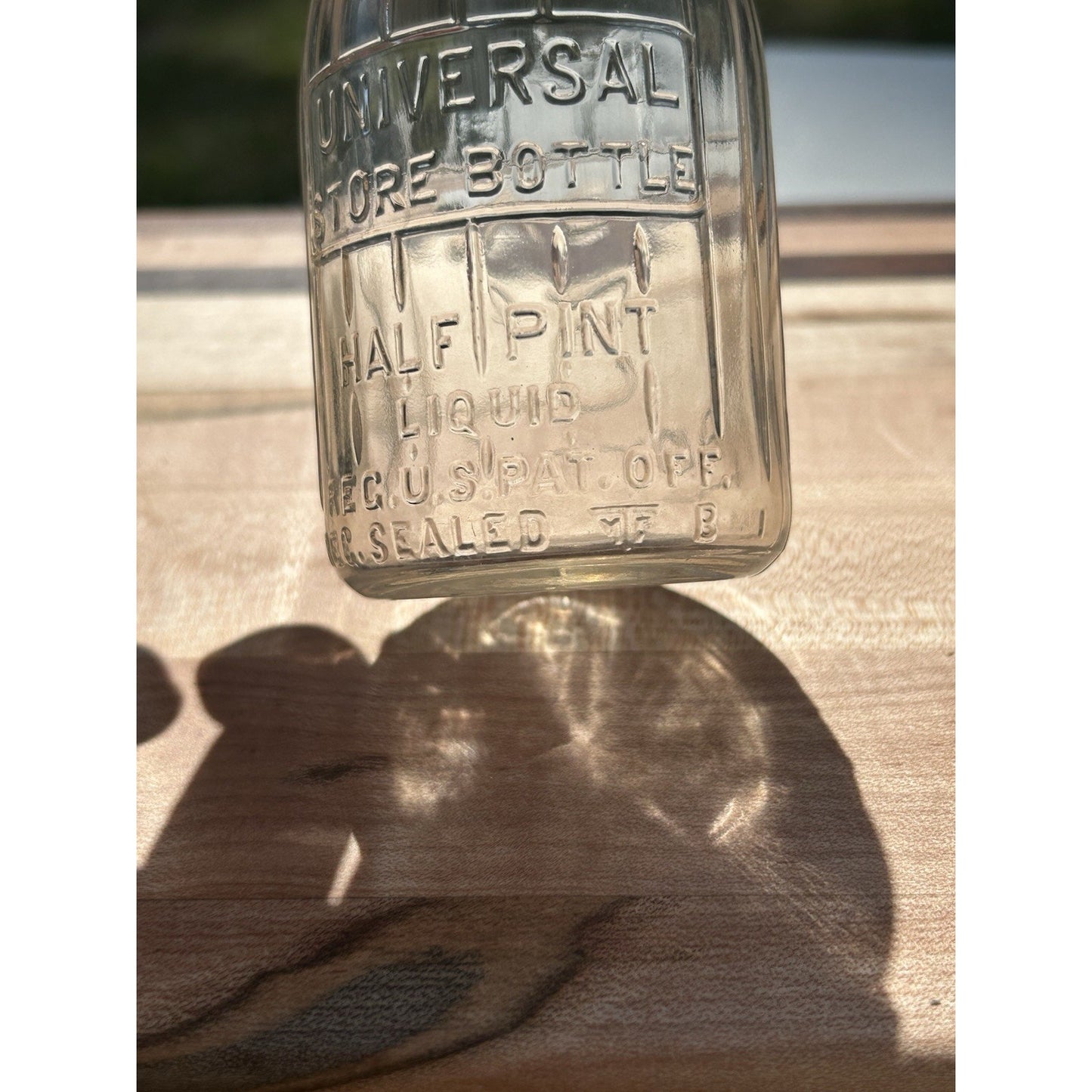 Half pint glass dairy bottle Universal Store full profile