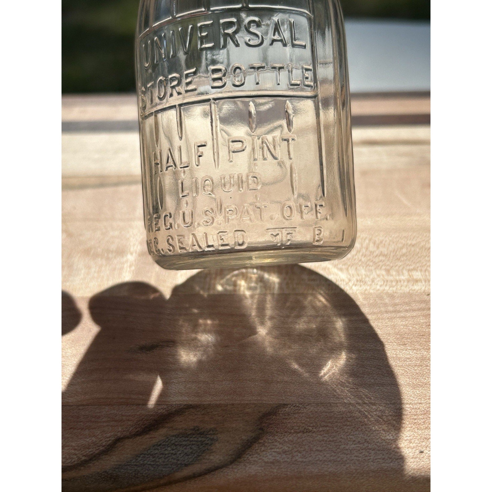 Half pint glass dairy bottle Universal Store full profile