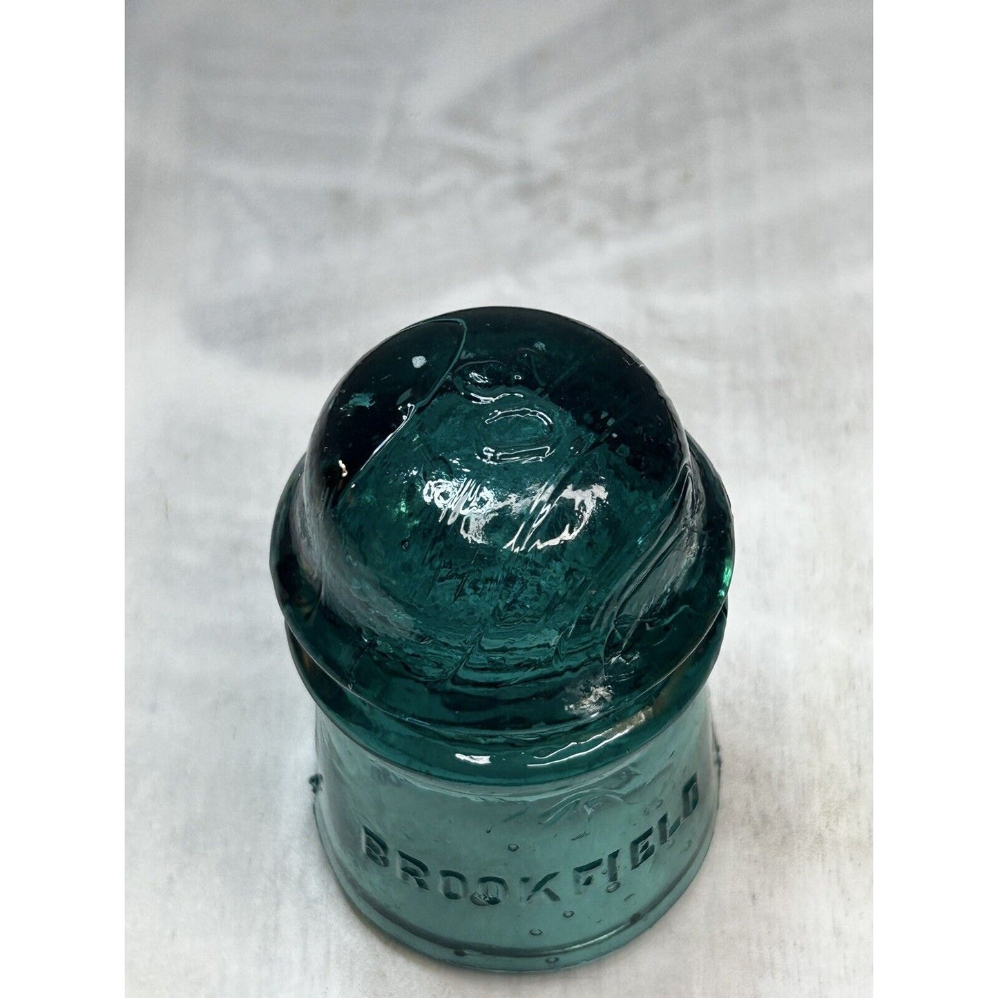 Antique Green Brookfield Glass Insulator — Embossed Dome Top — Uncommon Color
