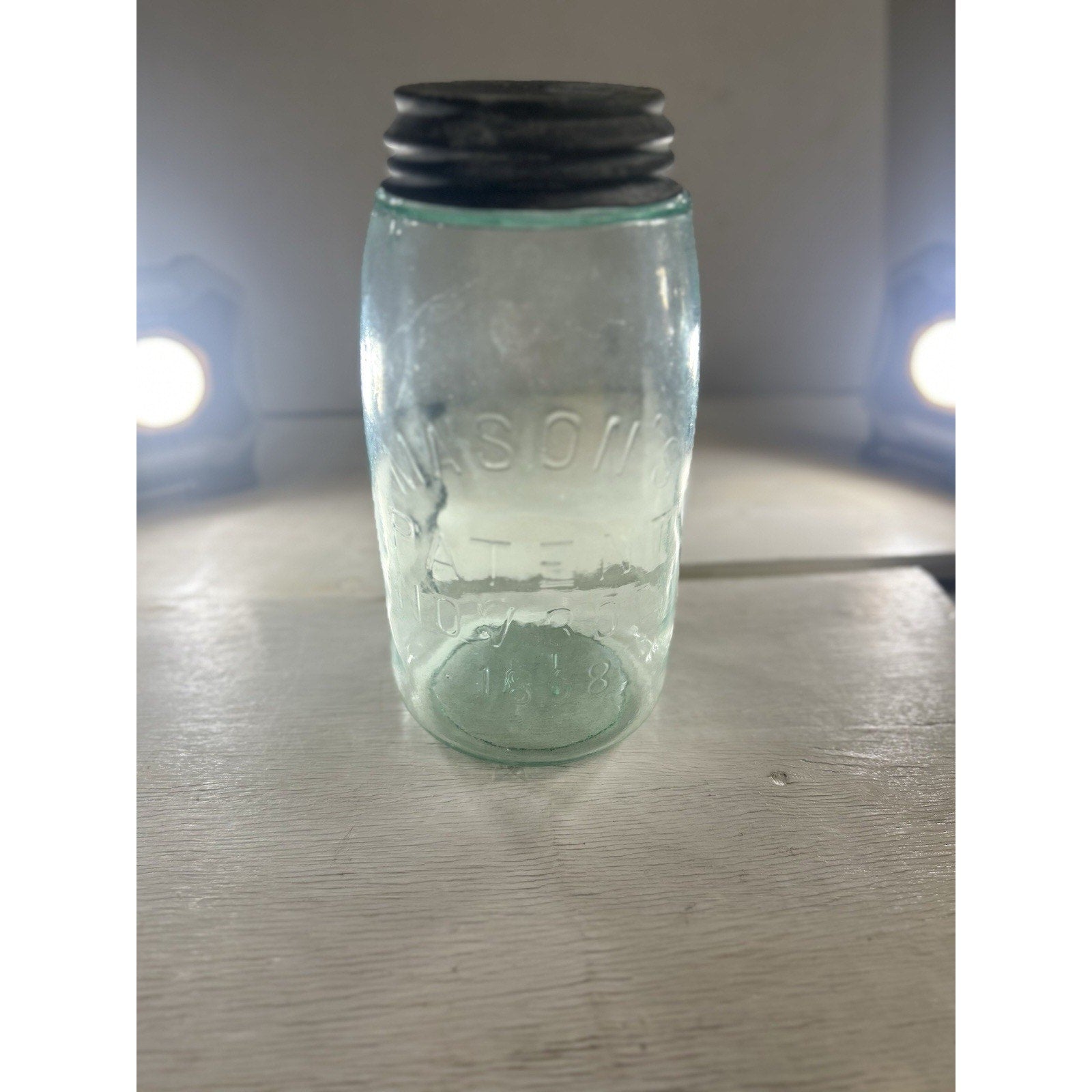 Antique 1858 Mason jar overall condition — no chips or cracks, aqua glass with original zinc lid