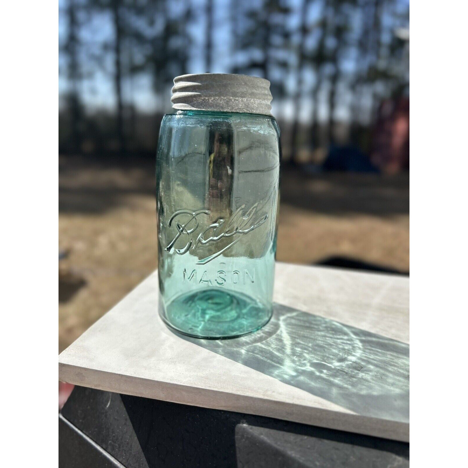 Ball Triple L 1900-1910 quart jar aqua blue side air bubble