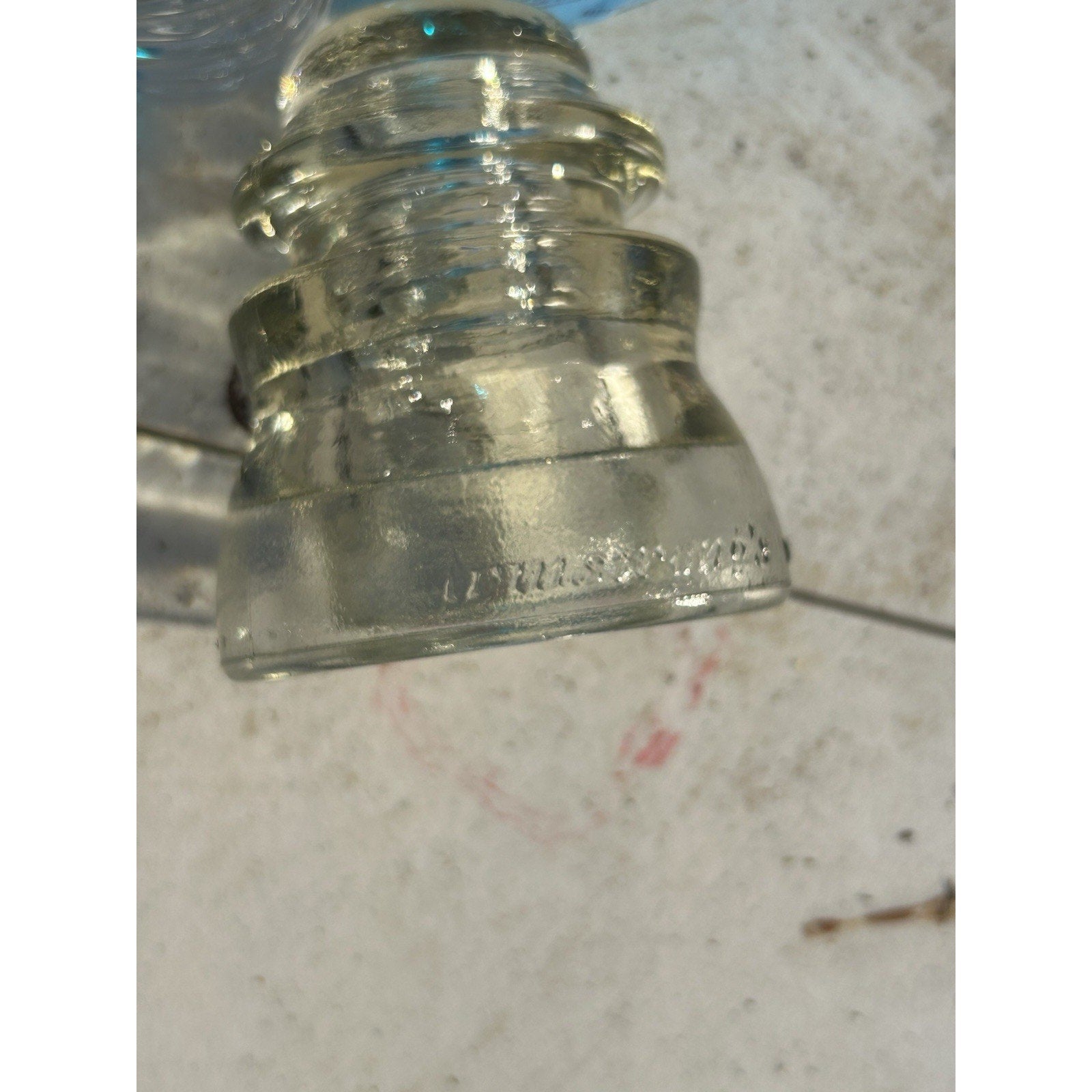 Vintage Armstrong DP-1 clear glass insulator back view USA
